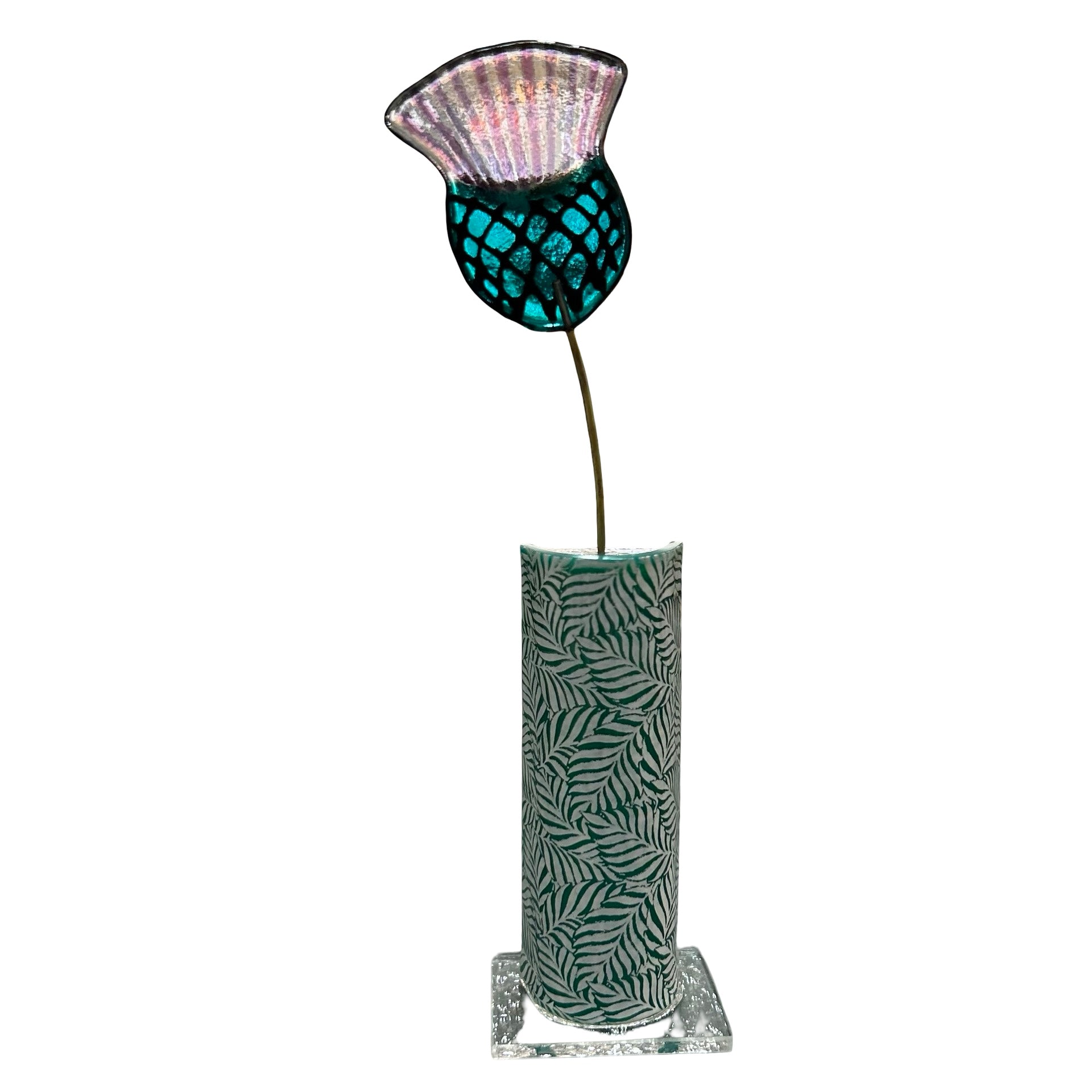 Decorative lamp with a glass thistle and base on a white background.
