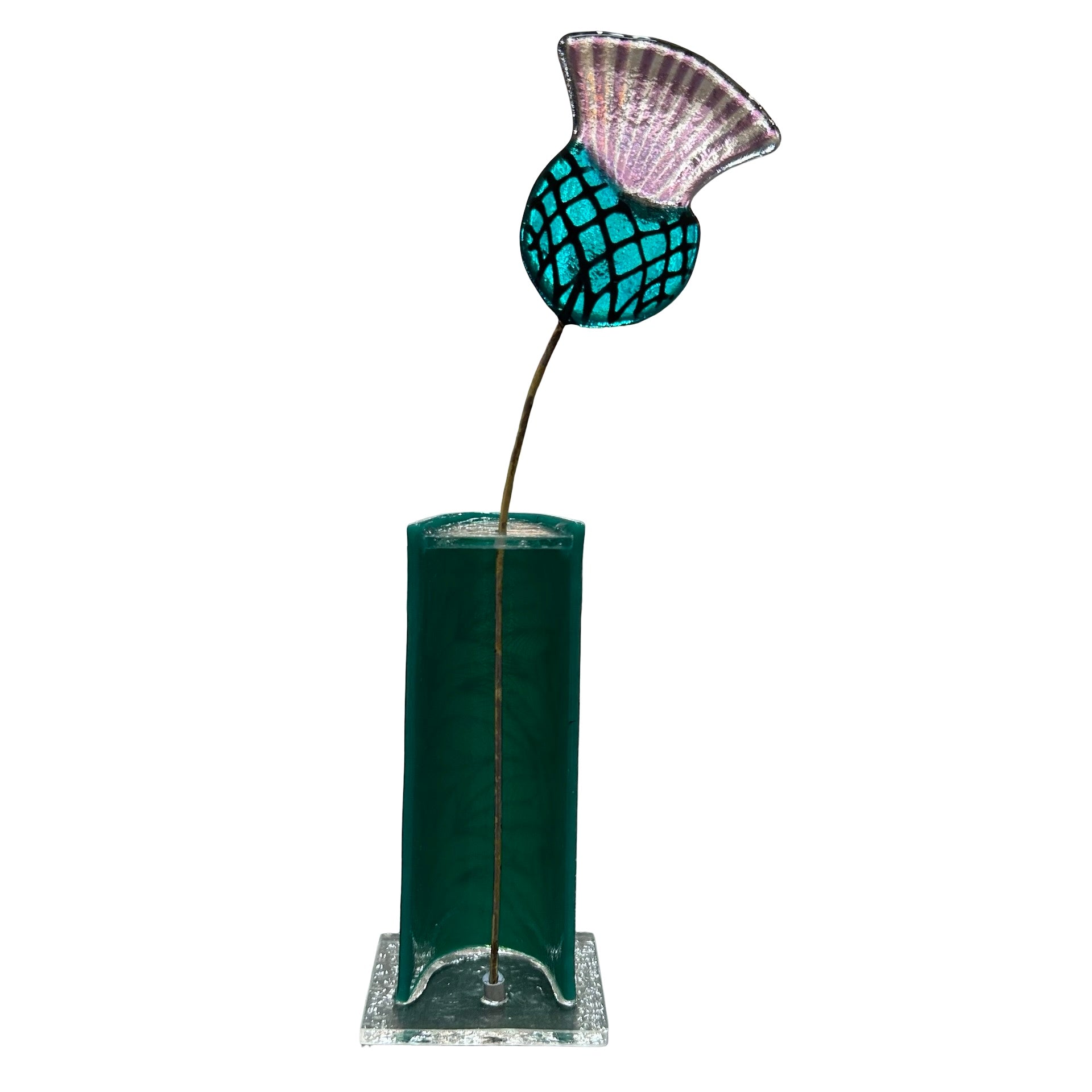 Decorative glass thistle with a teal and pink design in a vase on a white background.