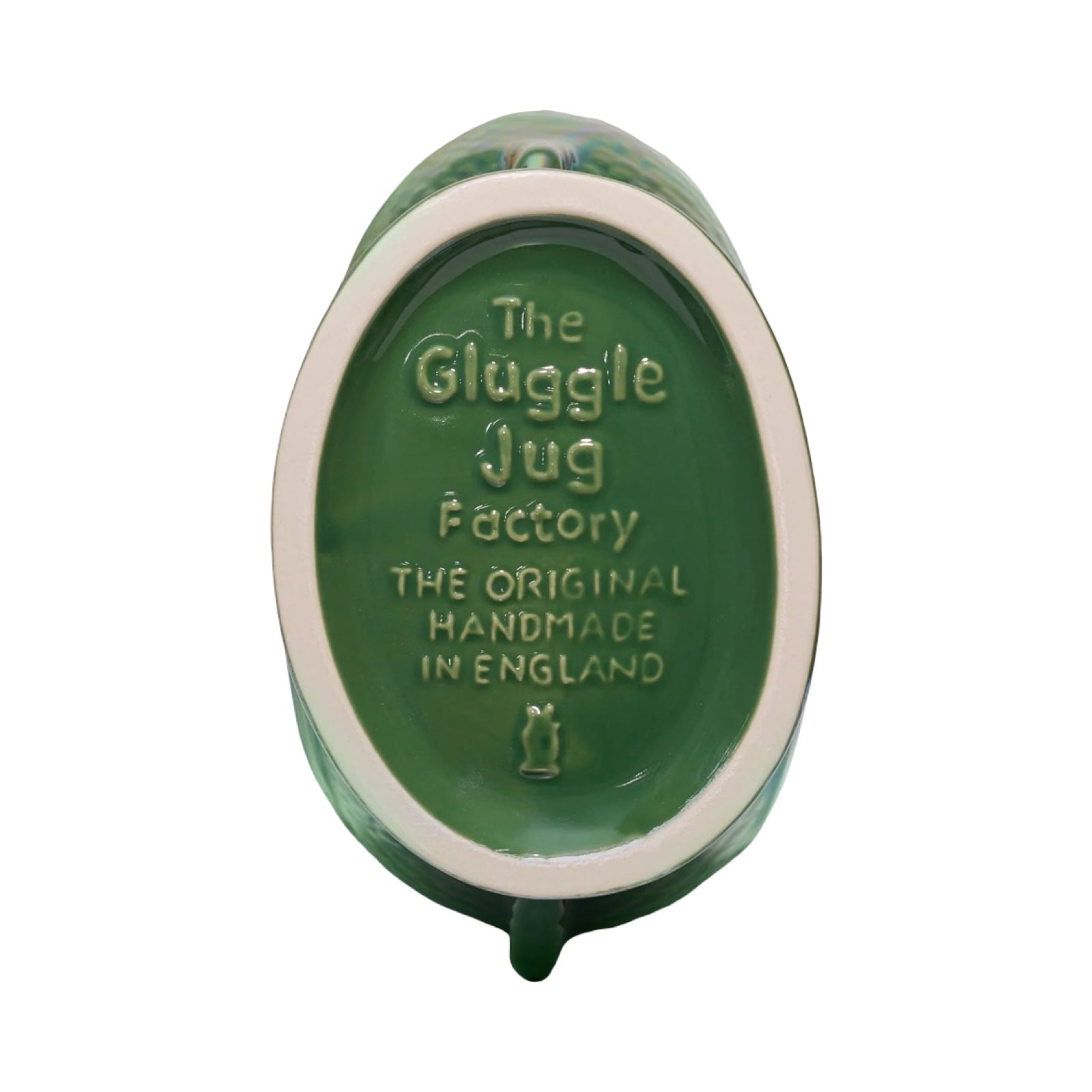 A green fish shaped gluggle jug.