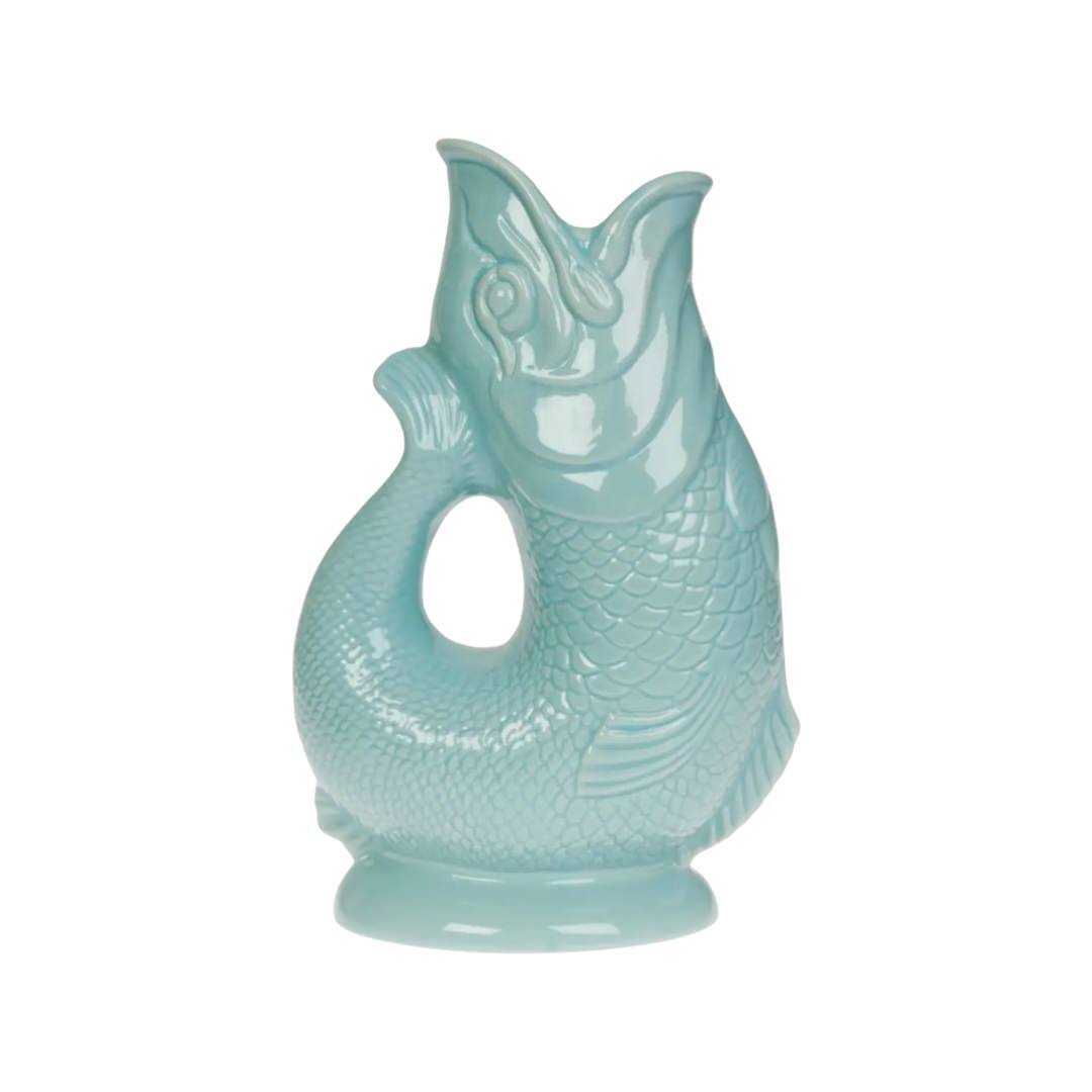 A mint coloured fish shaped gluggle jug.