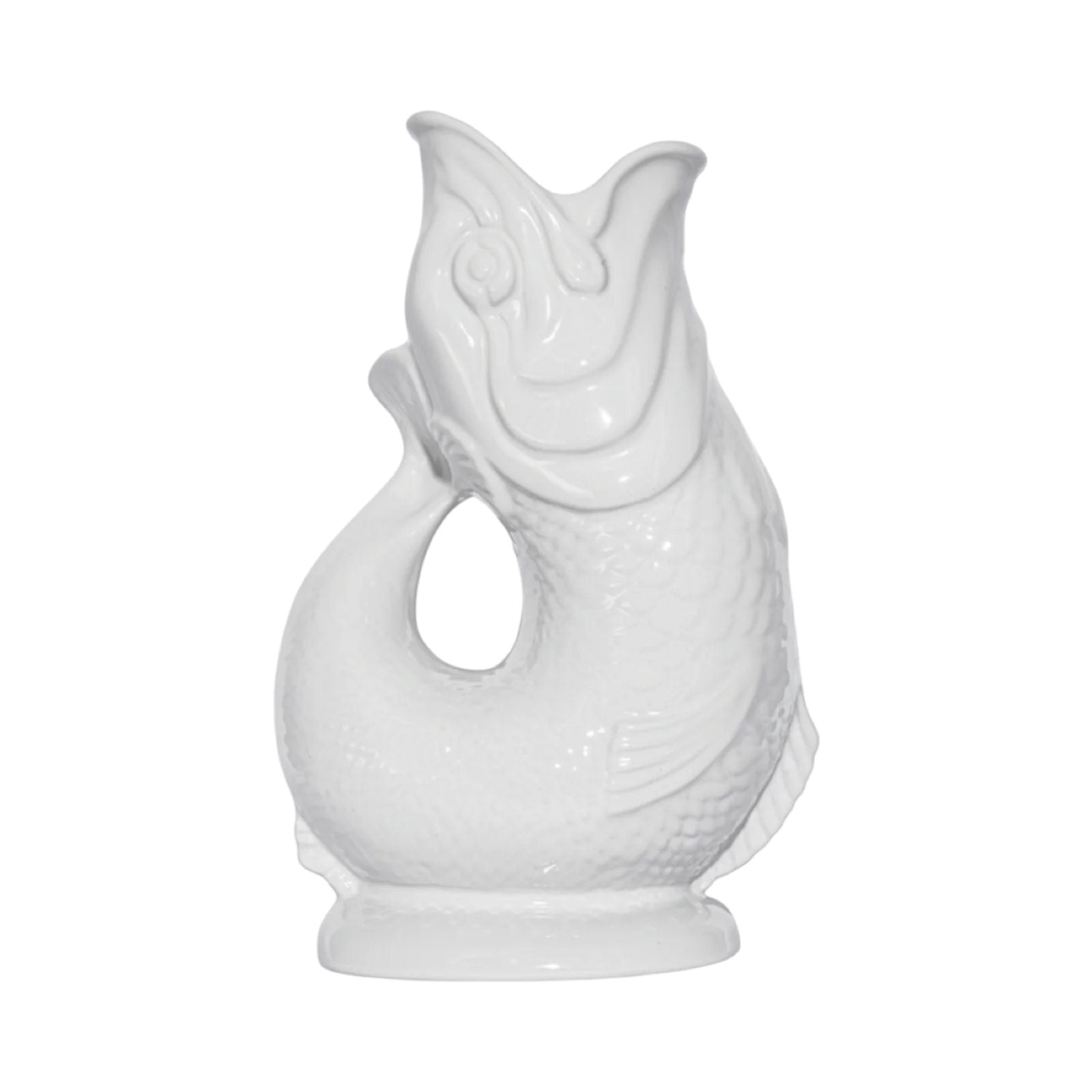 A white fish shaped gluggle jug.
