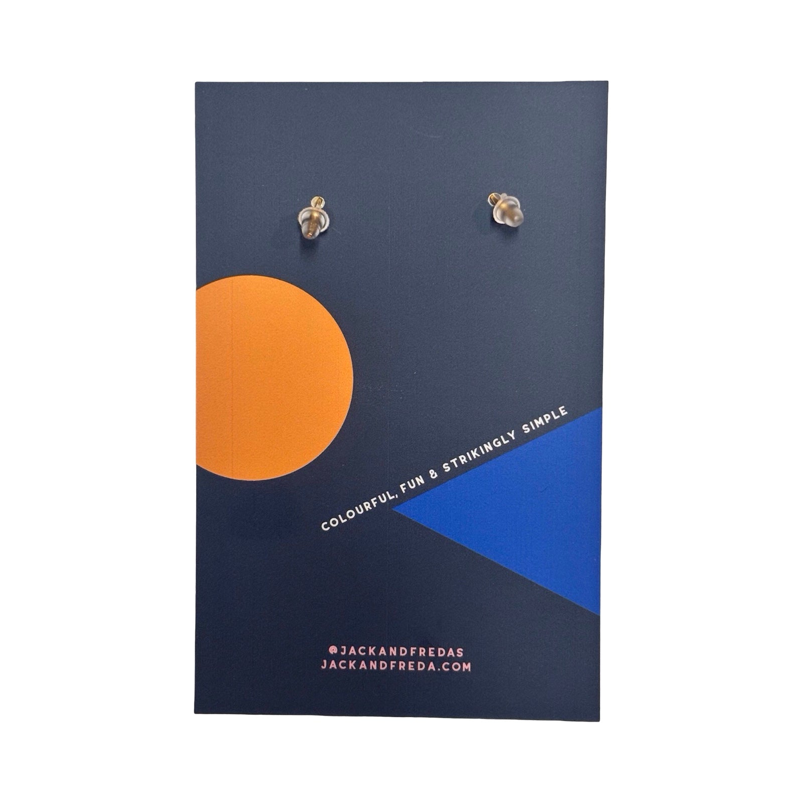 Back of a pair of earrings on a Jack and Freda branded card with geometric design.