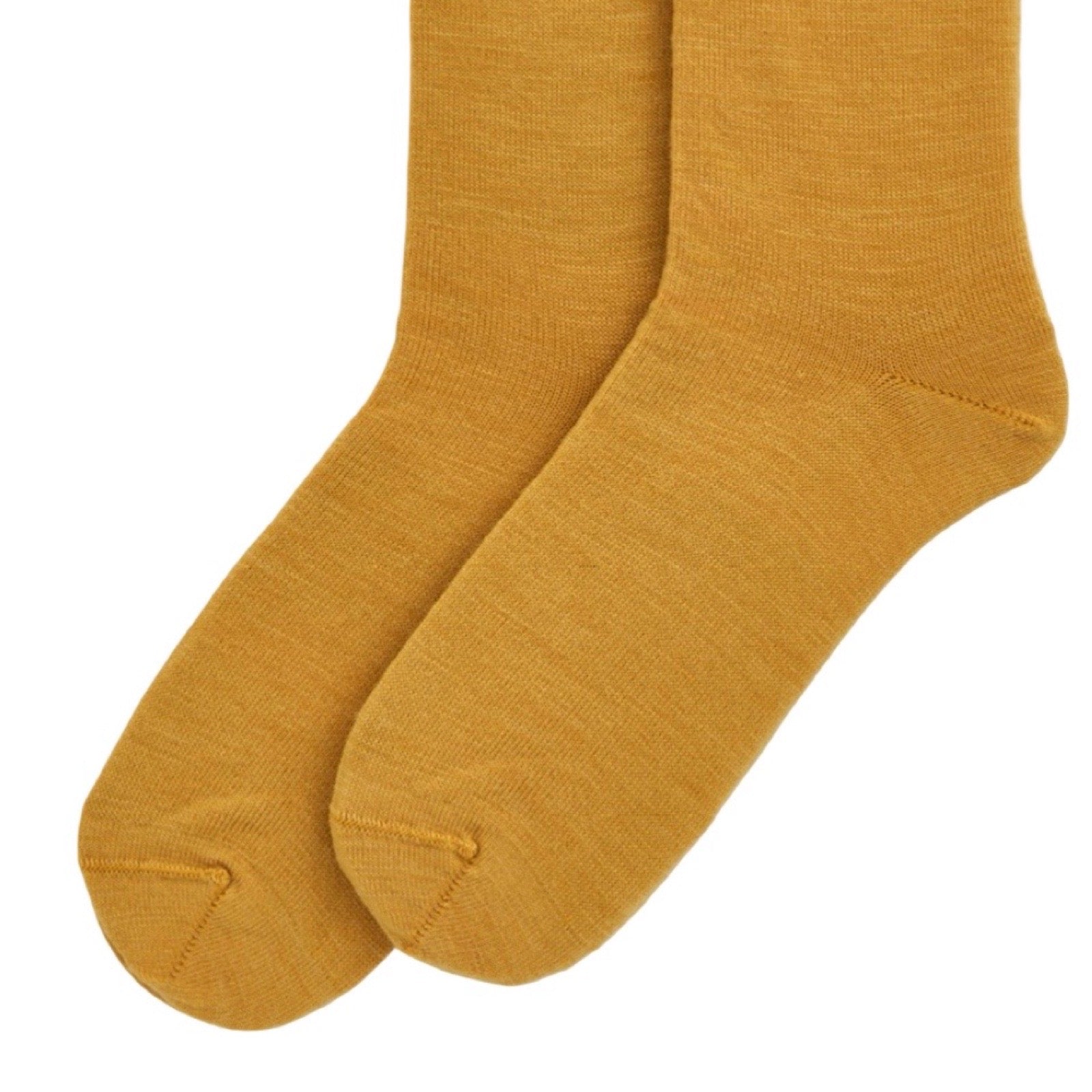 Pair of mustard yellow socks on a white background.