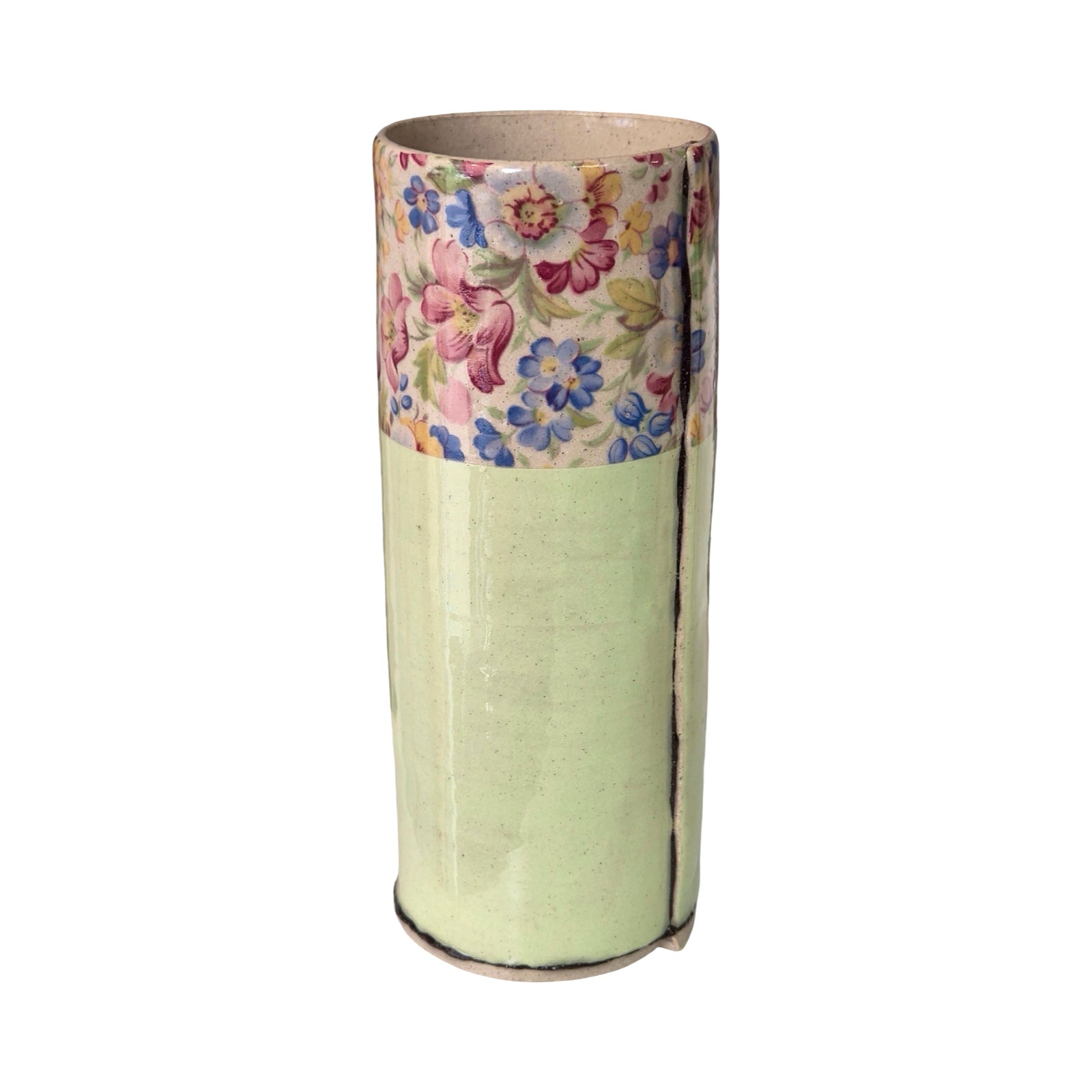 Cylindrical vase with floral pattern on a white background.