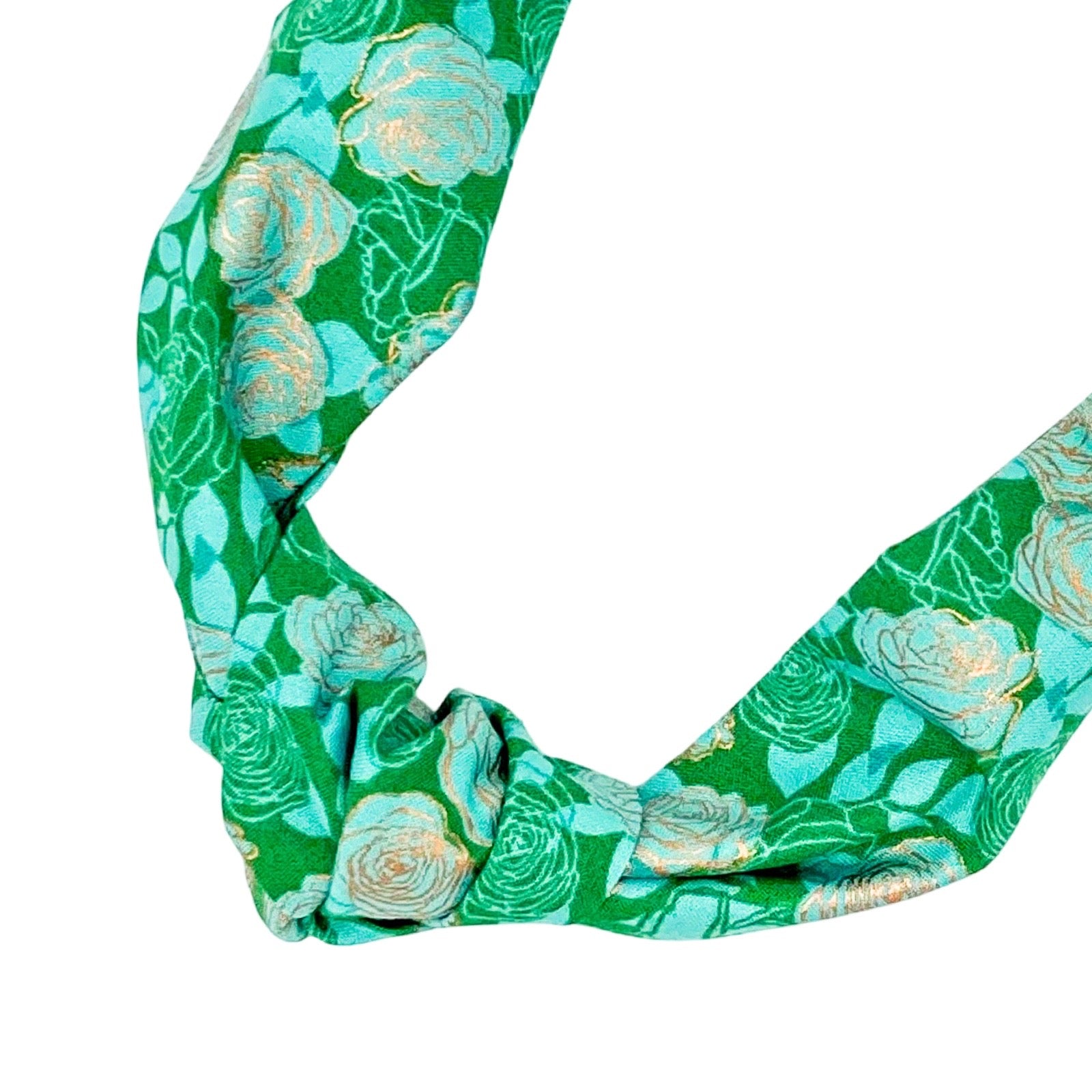 Handmade checked top knot Alice band in a green fabric.