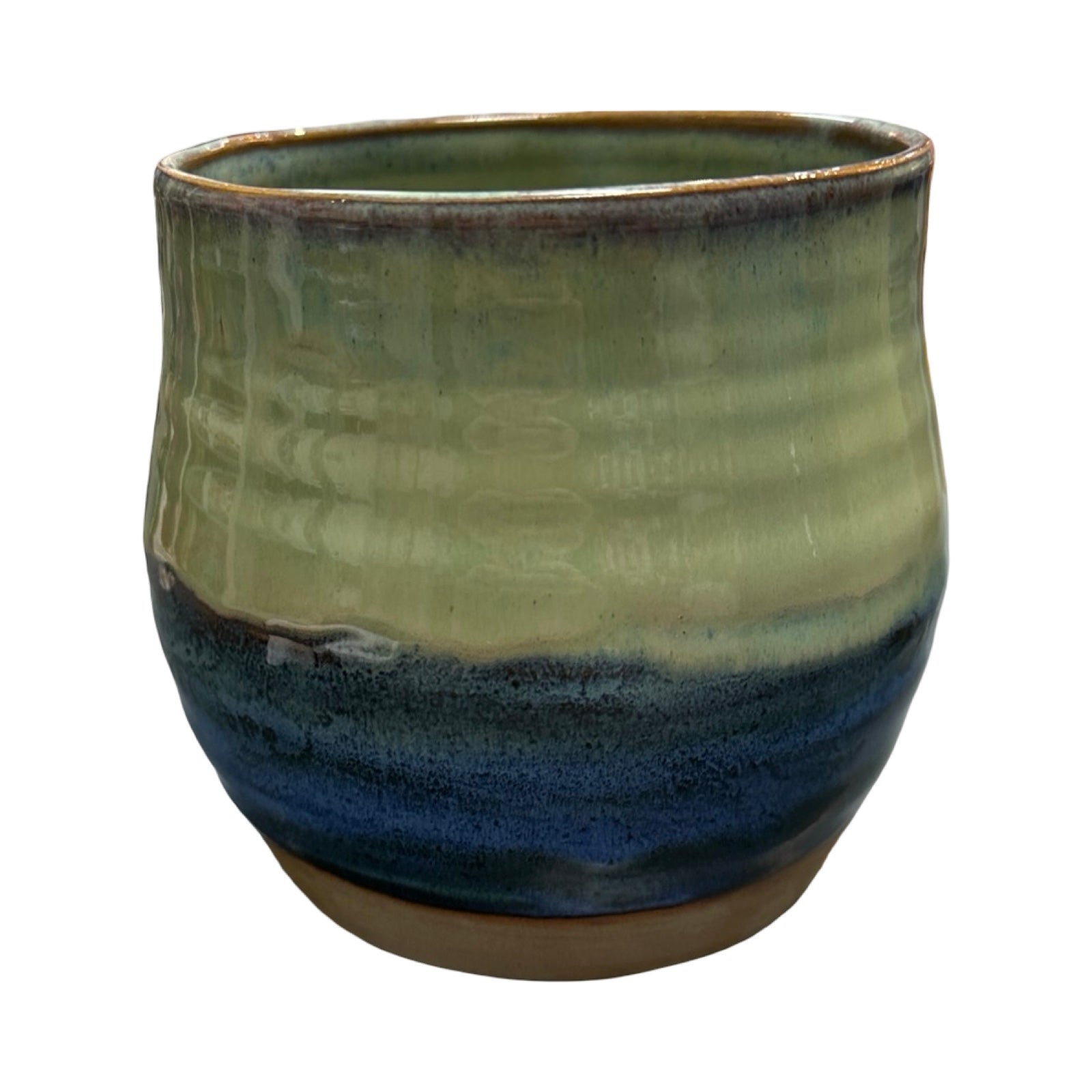 Ceramic plant pot with green and blue gradient on a white background.