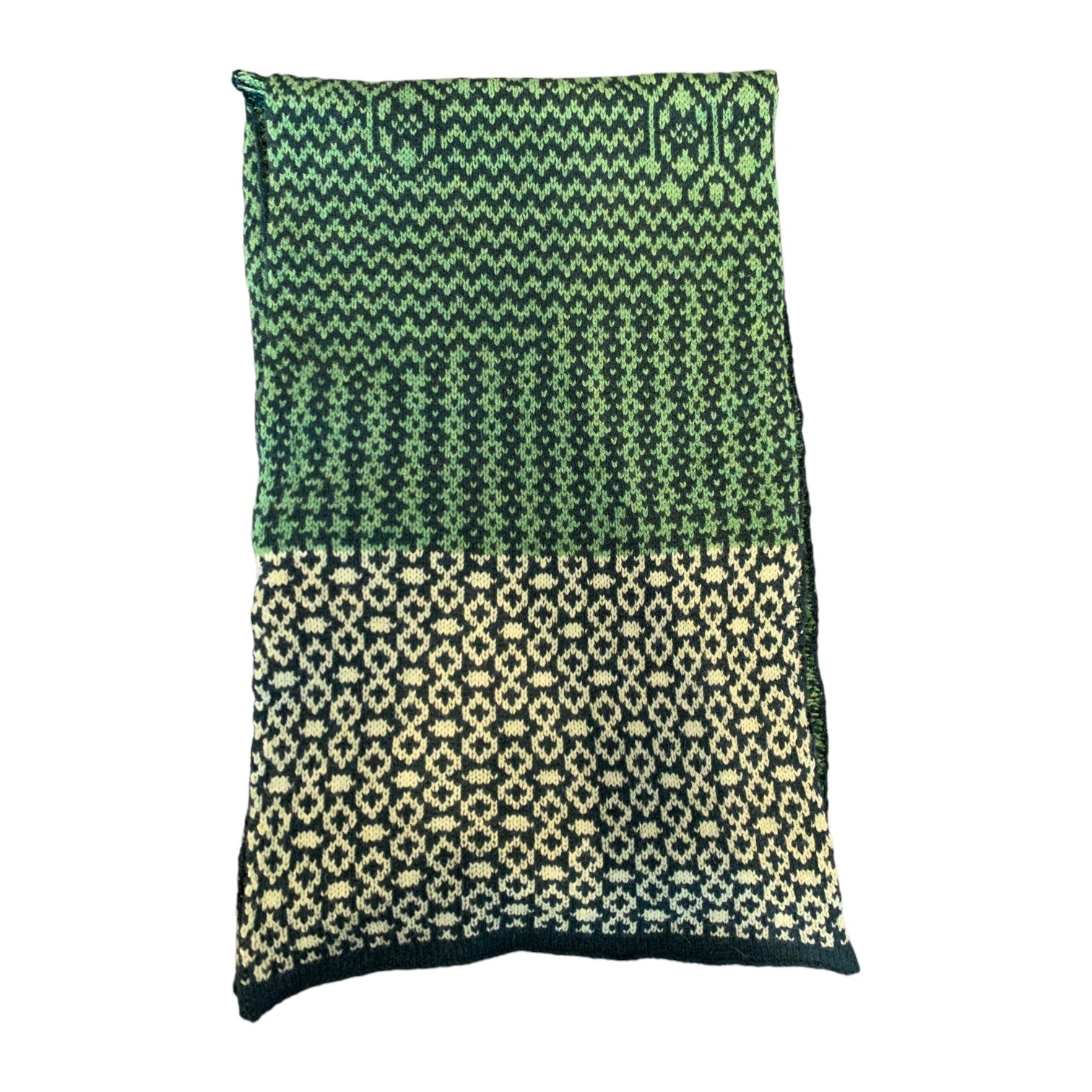 A cosy and soft 100% lambswool knitted scarf with a green, lime and black geometric design.