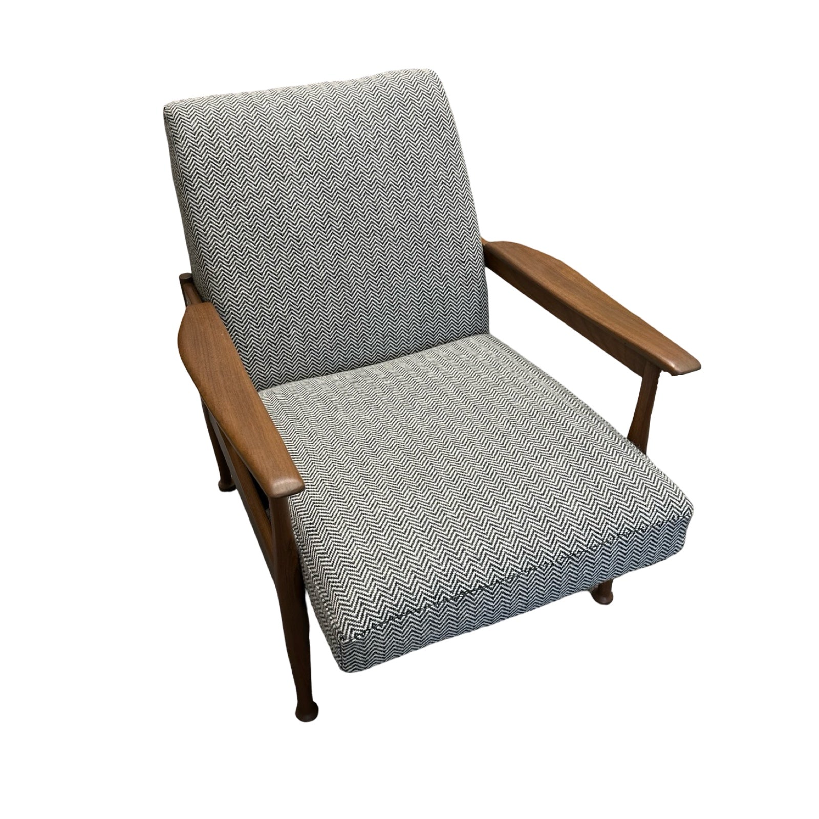 Photo of a Guy Rodgers reclining chair, in a grey chevron fabric, on a white background.