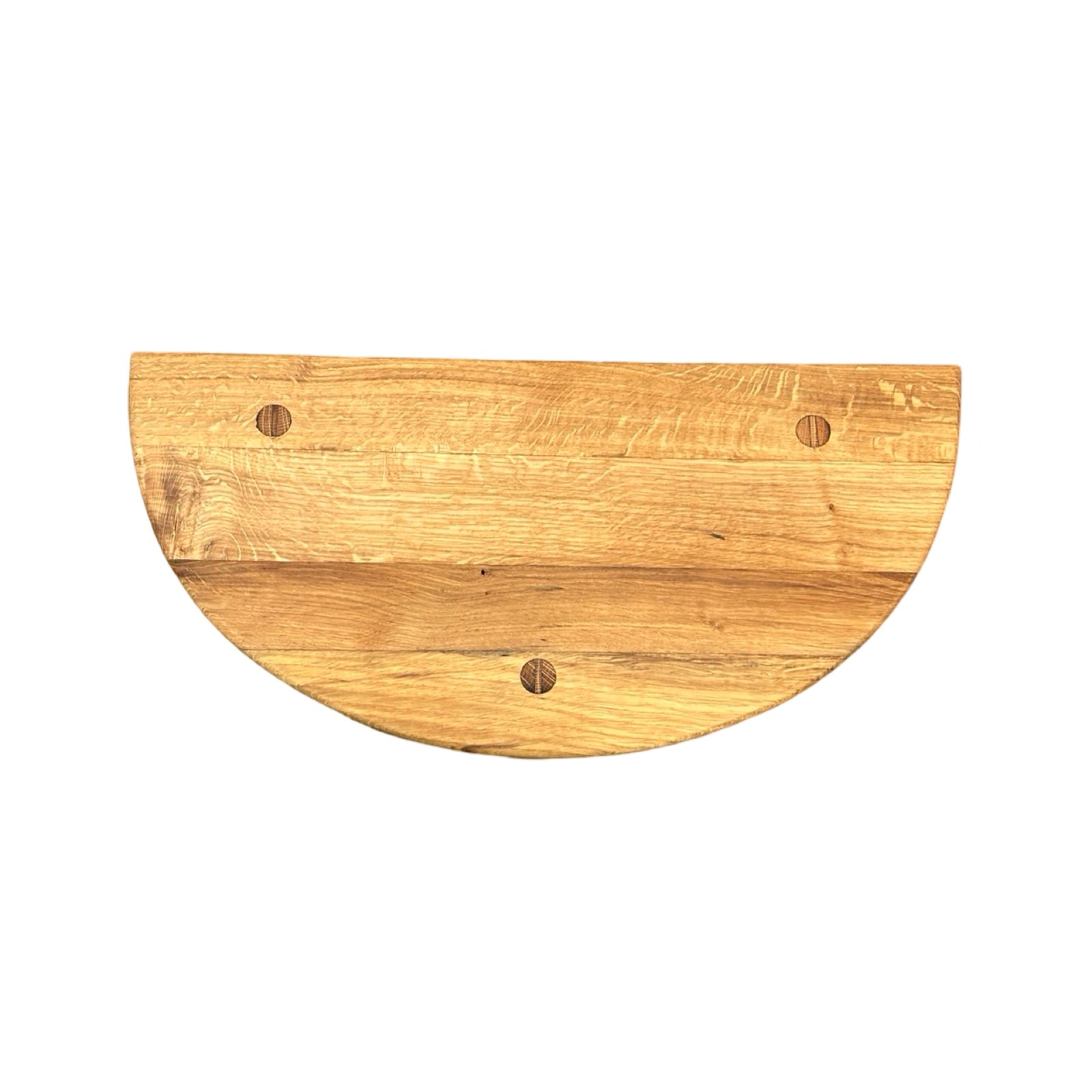 The top of a wooden half moon table.