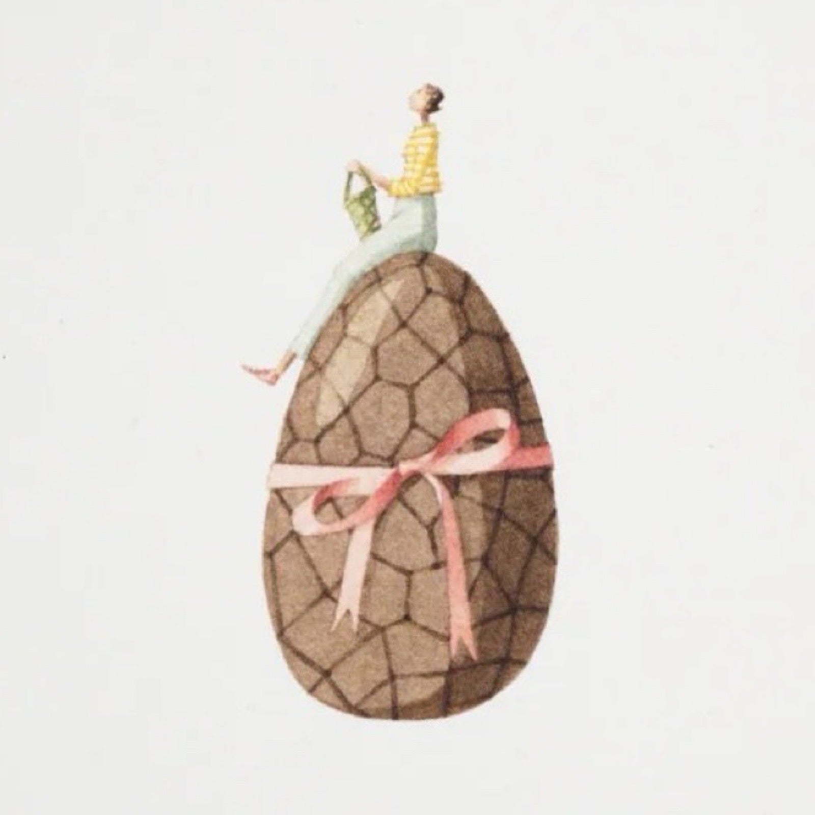 Decorative egg with a cracked texture and a small figurine on top, set against a light grey background.