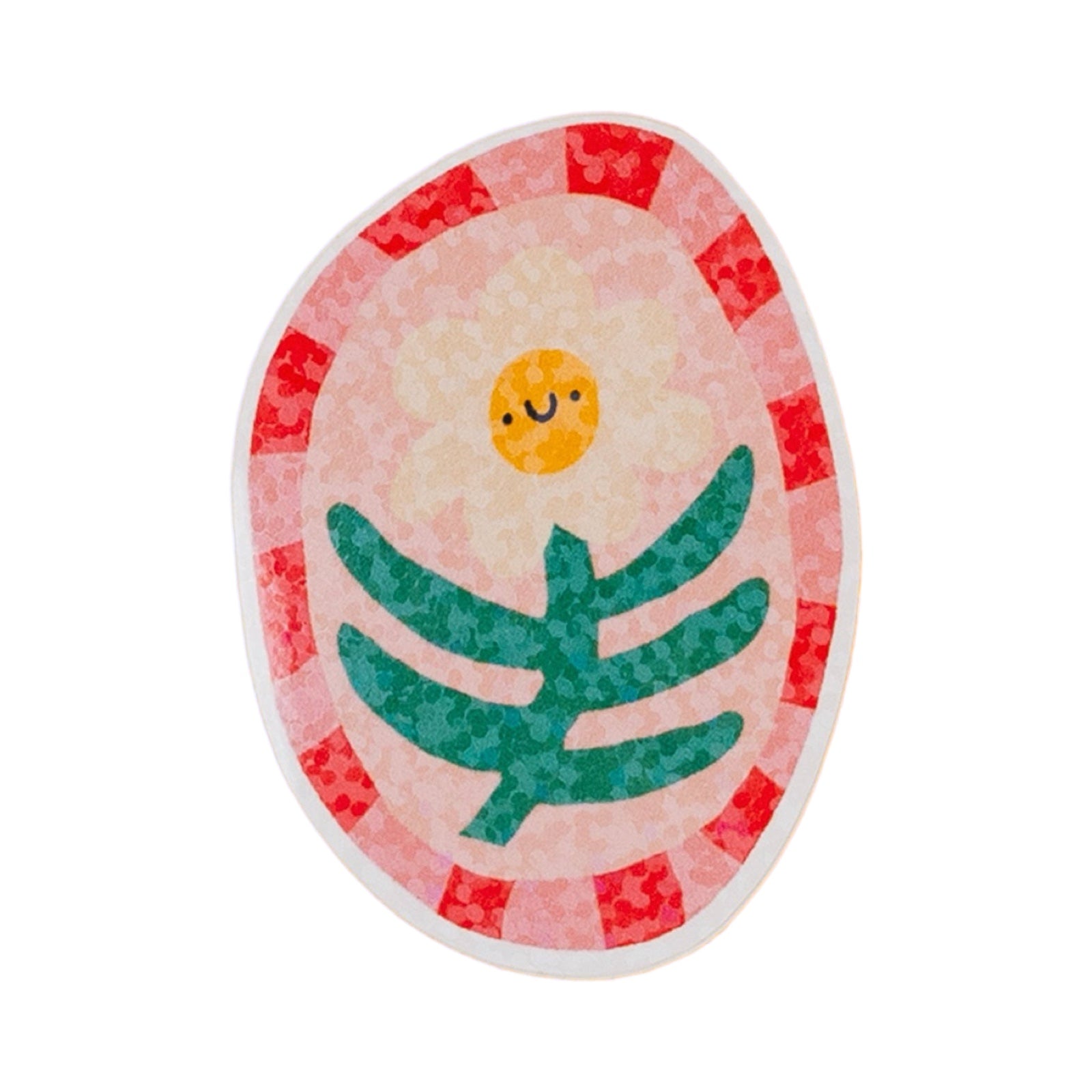 An oval-shaped sticker featuring a cute cartoon design. The design has a light pink background with a white border, alternating red and pink patterned segments around the edge, a small yellow smiling sun, and a green stylised leaf motif in the centre.