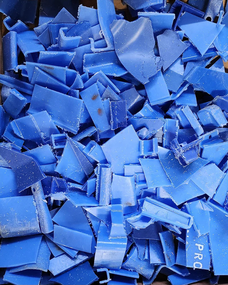 Pile of blue plastic pieces.