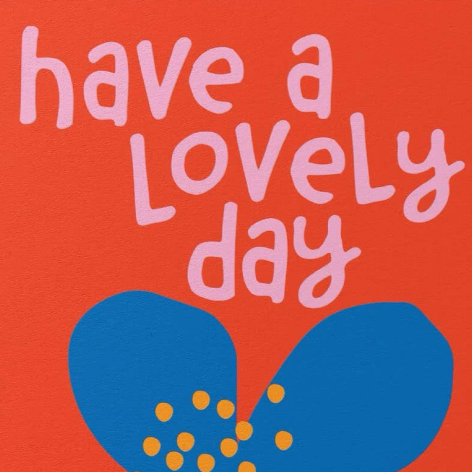 Colourful card featuring an abstract blue flower against a red background with the text 'have a lovely day'.