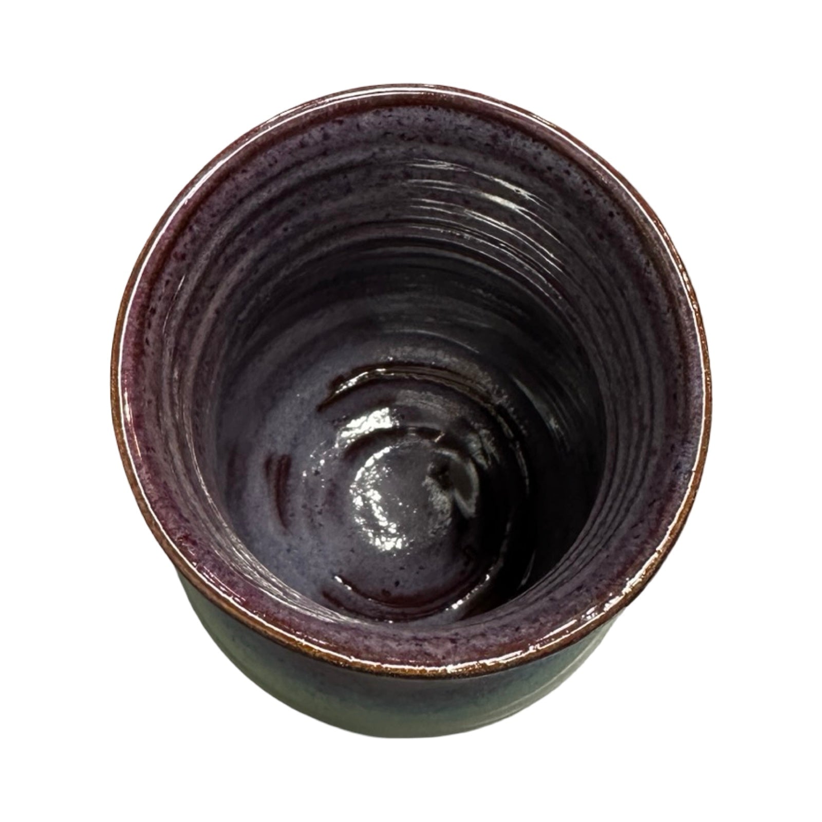 Top view of a dark ceramic vase on a white background.