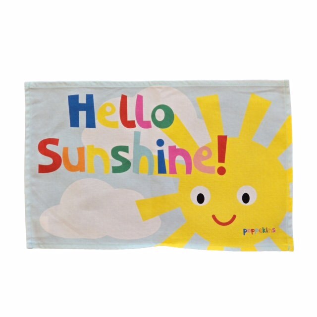 Colourful fabric placemat featuring a bright yellow sun and the text 'Hello Sunshine' in multicoloured lettering on an aqua-blue background.