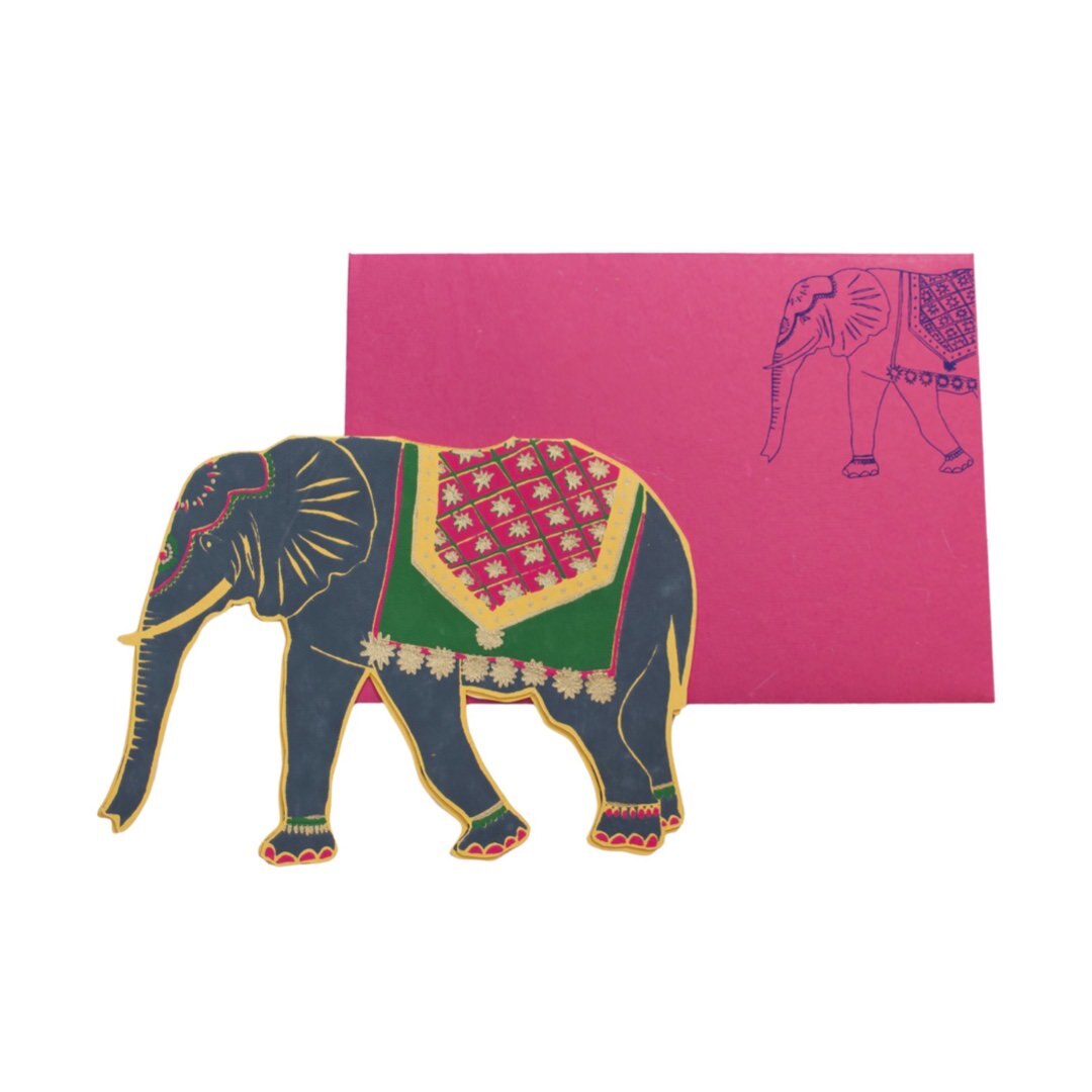 Indian elephant shaped card featuring a grey elephant with a green, pink and yellow blanket and a bright pink envelope.