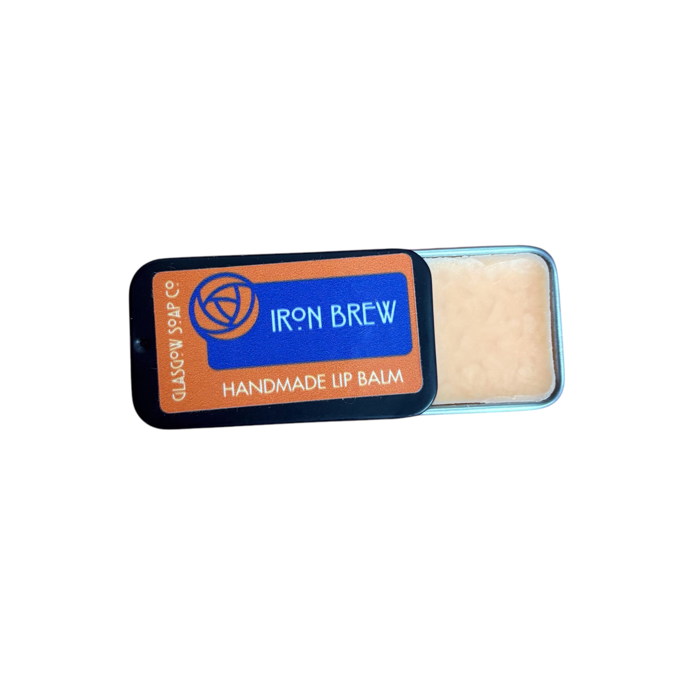A small black tin of iron brew flavoured lip balm, half open.