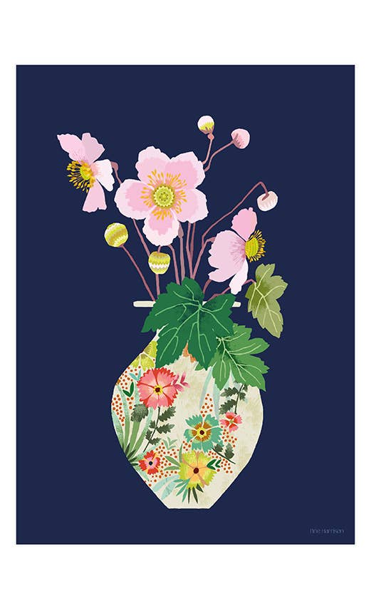 Decorative vase with flowers on a navy background.
