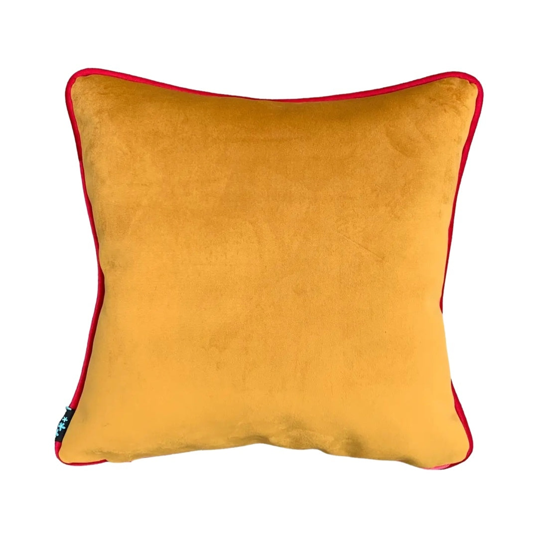 Mustard velvet back of the jazzy jungle cushion.