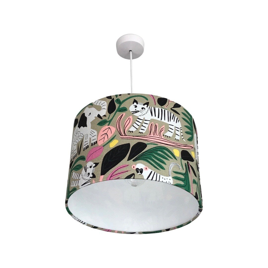 Drum lampshade with black and white jungle animals and colourful leaves on a grey background