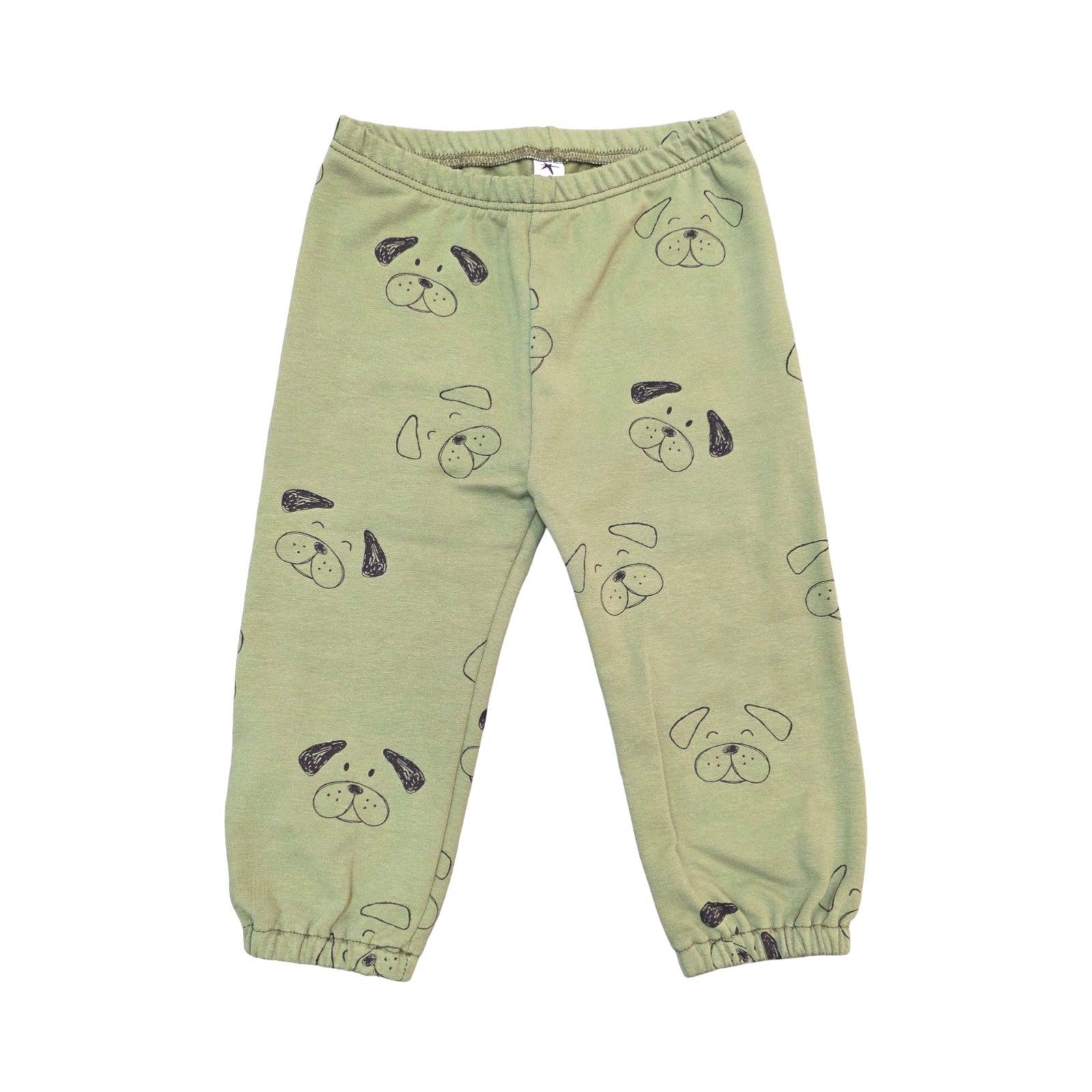 Green children's pants with dog prints on a white background.