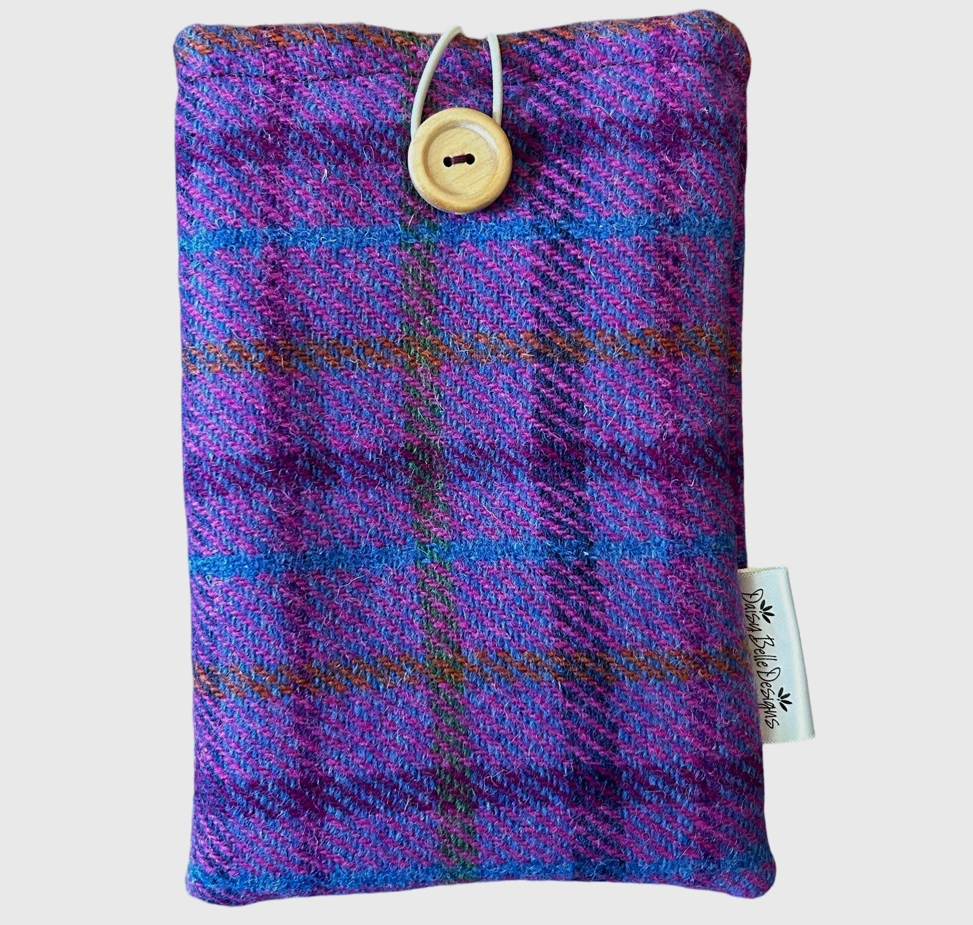 Purple Harris tweed Kindle Sleeve with wooden button and elastic loop at the top.