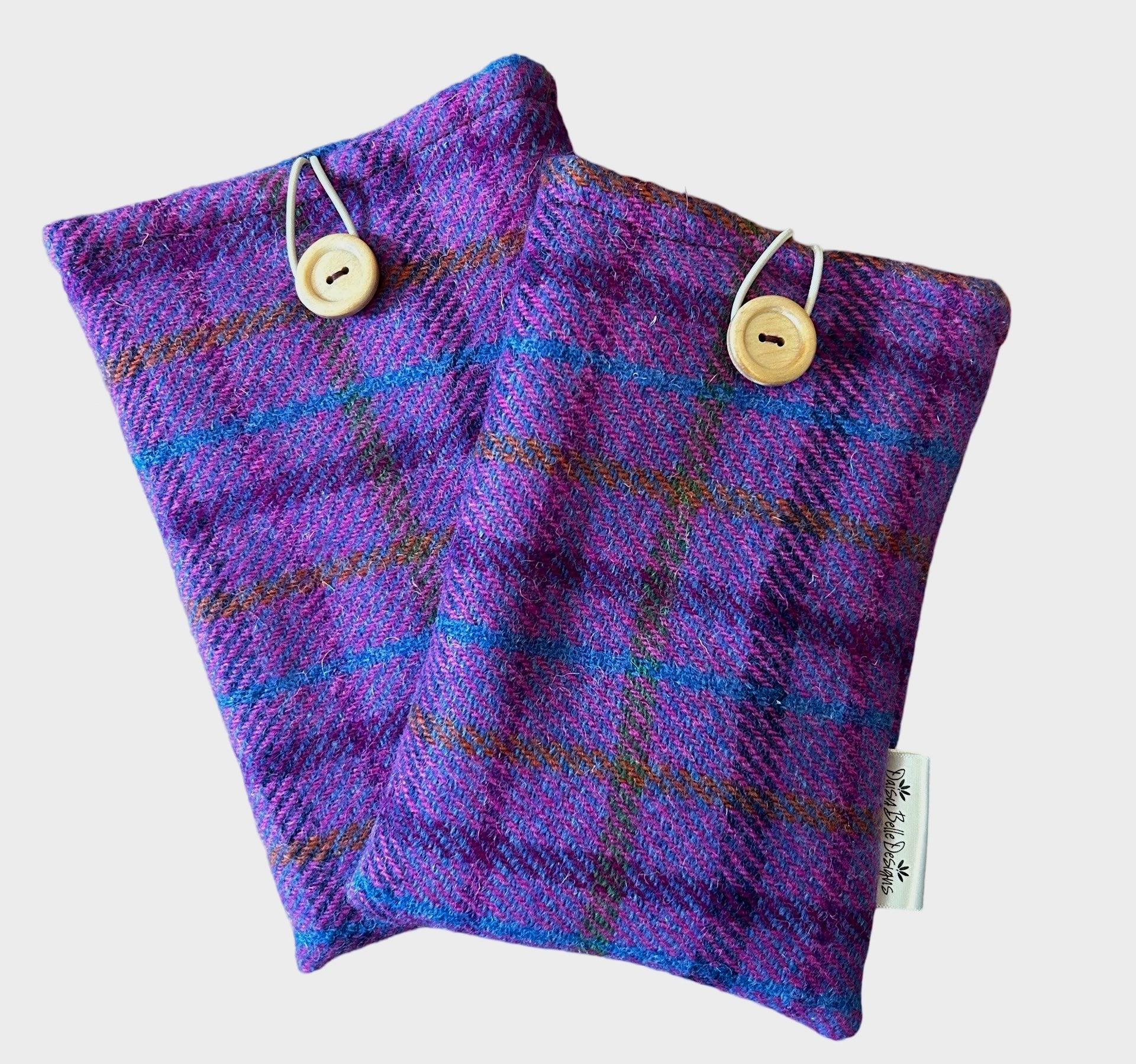 Two Harris tweed E Reader or Kindle Sleeves in purple striped tweed. Both sizes have a wooden button and elastic loop closing at the top.