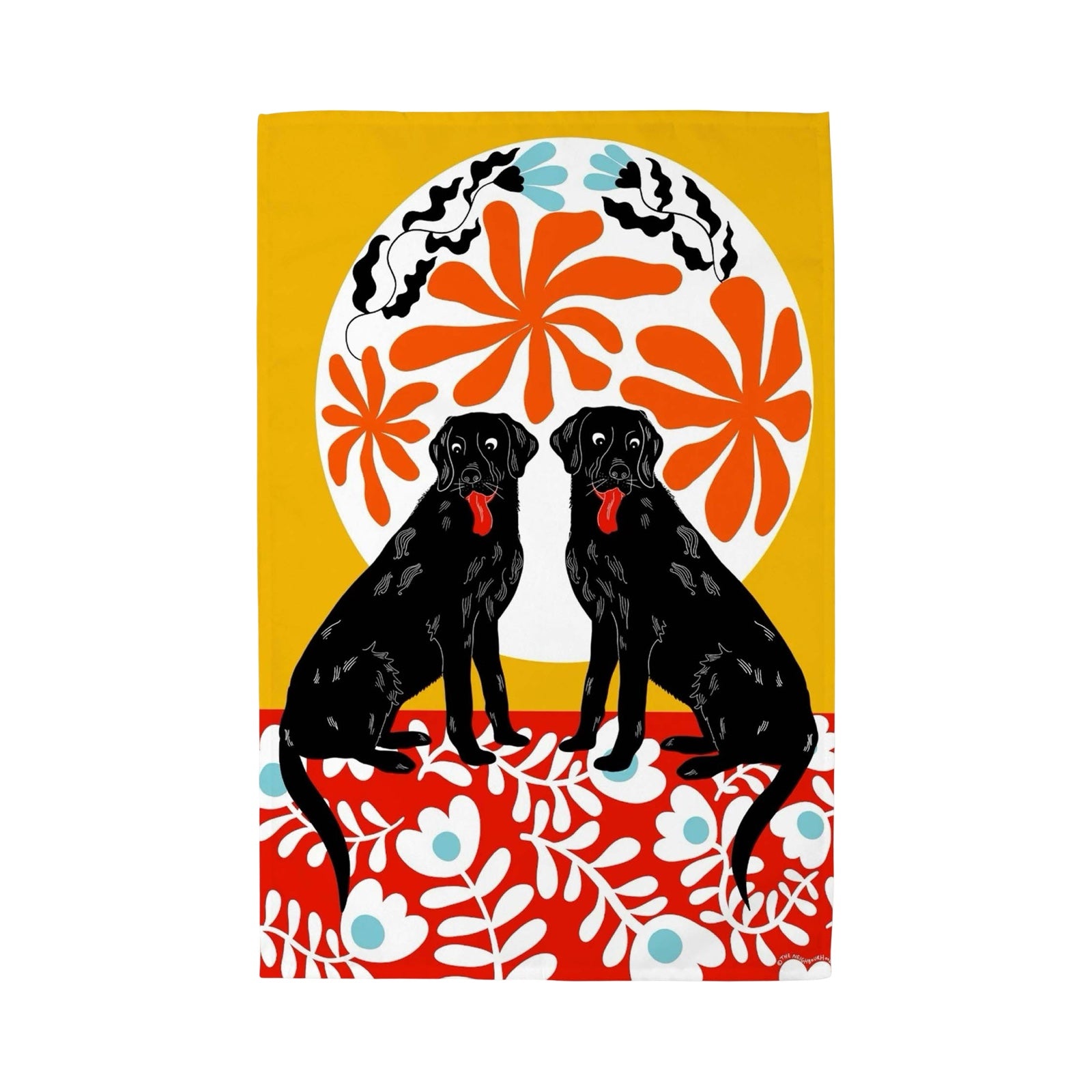 Tea towel of two black labrador dogs sitting on a red floral blanket under the moon.