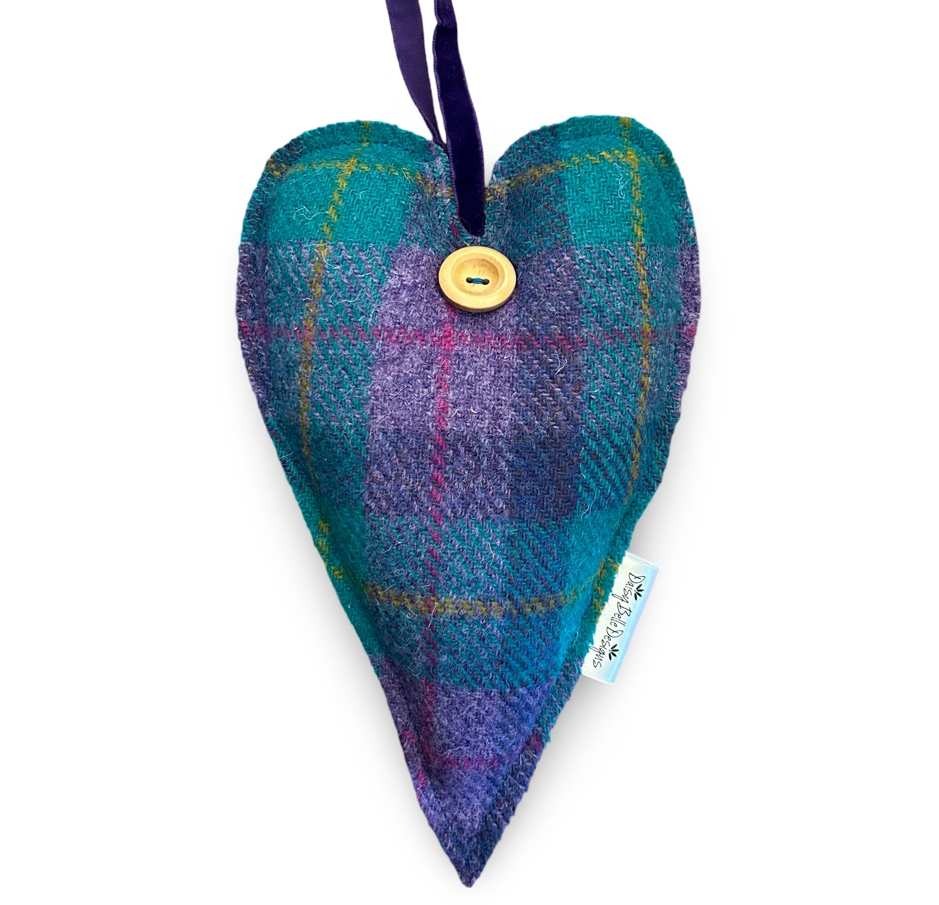 Large turquoise and lilac tartan tweed heart filled with dried lavender. The heart has a wooden button and a purple velvet hanging loo.