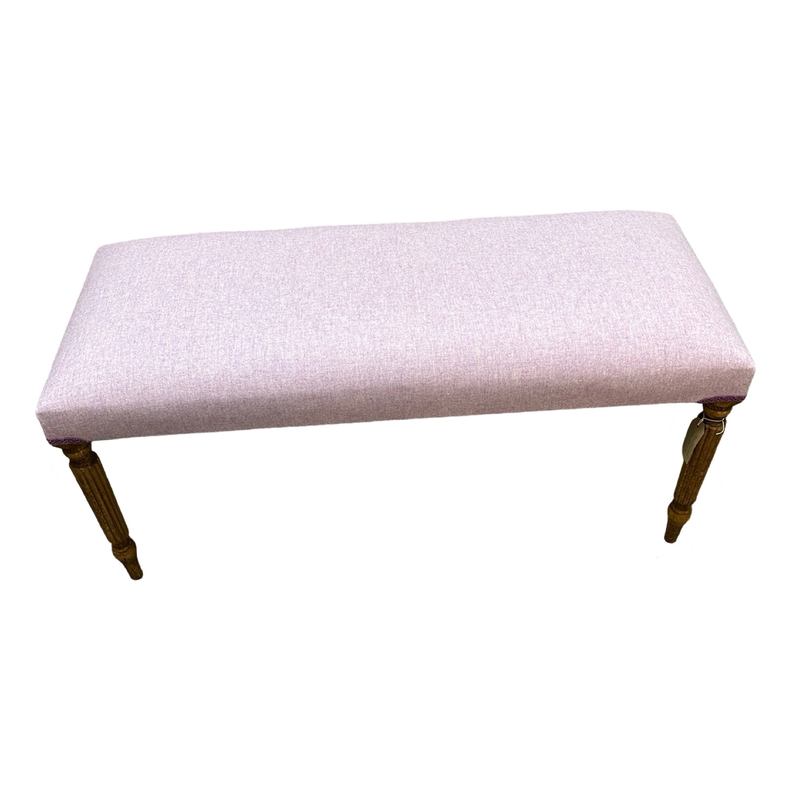 A rectangular wooden bench covered in lavender wool mix fabric with mahogany stained legs.