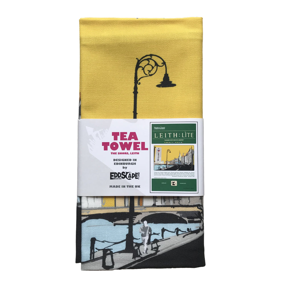 Tea towel featuring a travel book poster design with an original illustration of the Shore area in Leith, Edinburgh.