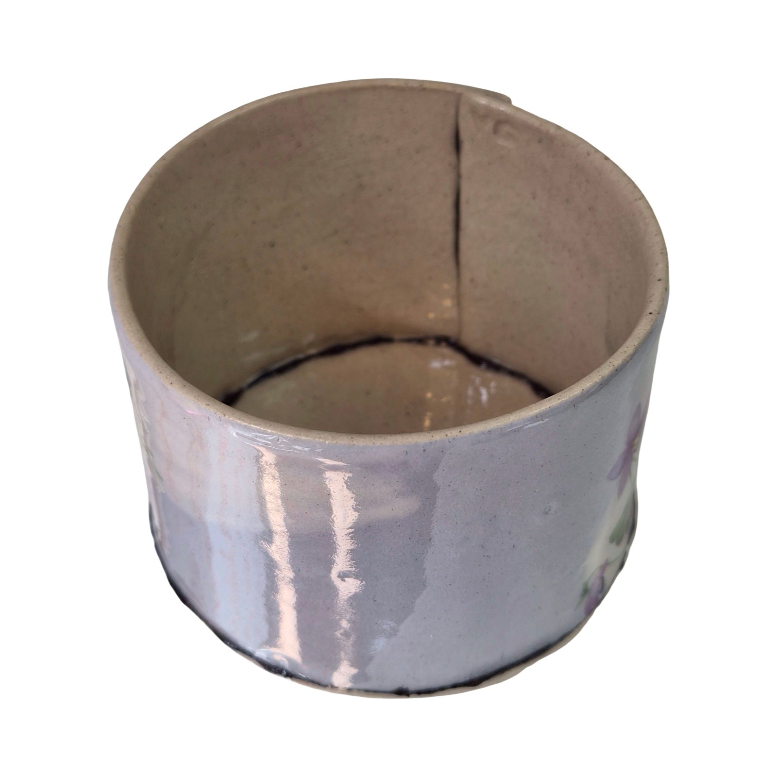 Ceramic pot inside on a white background.
