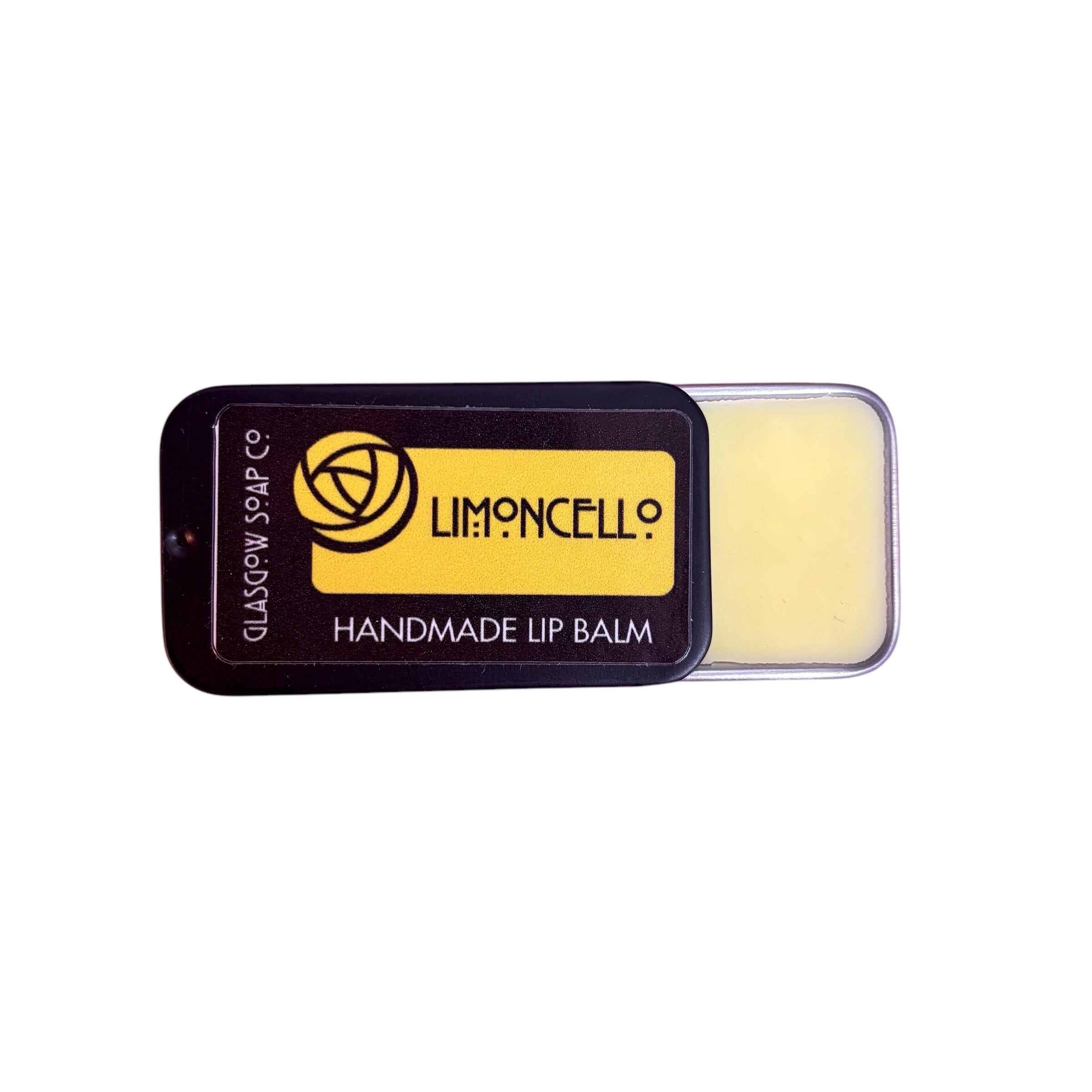 A small black tin of limoncello lip balm, half open