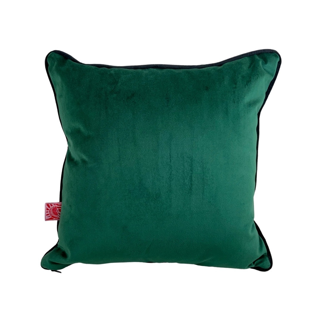 Green velvet back of a lobster cushion.