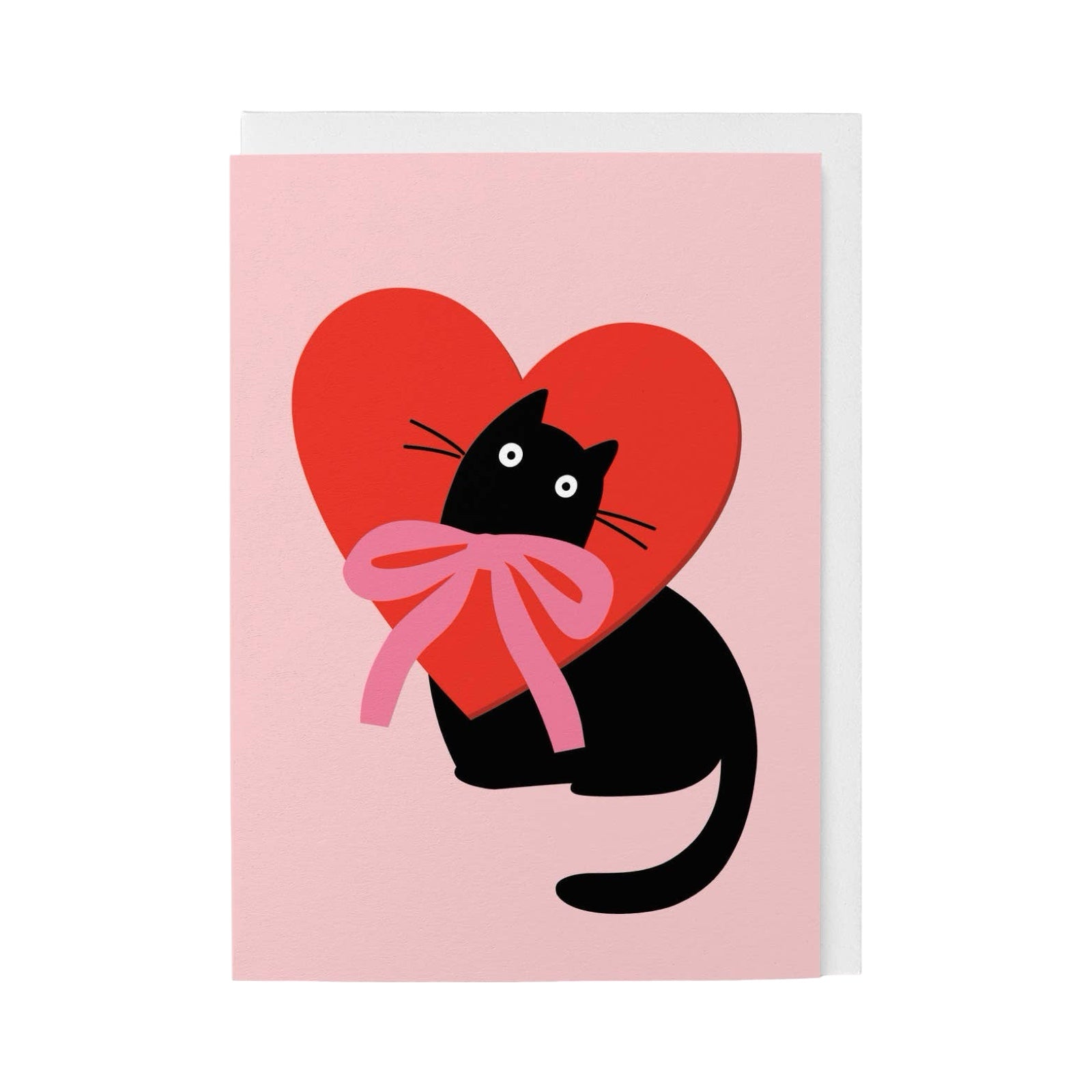 Card with a black cat holding a red heart with a pink bow on a pink background.
