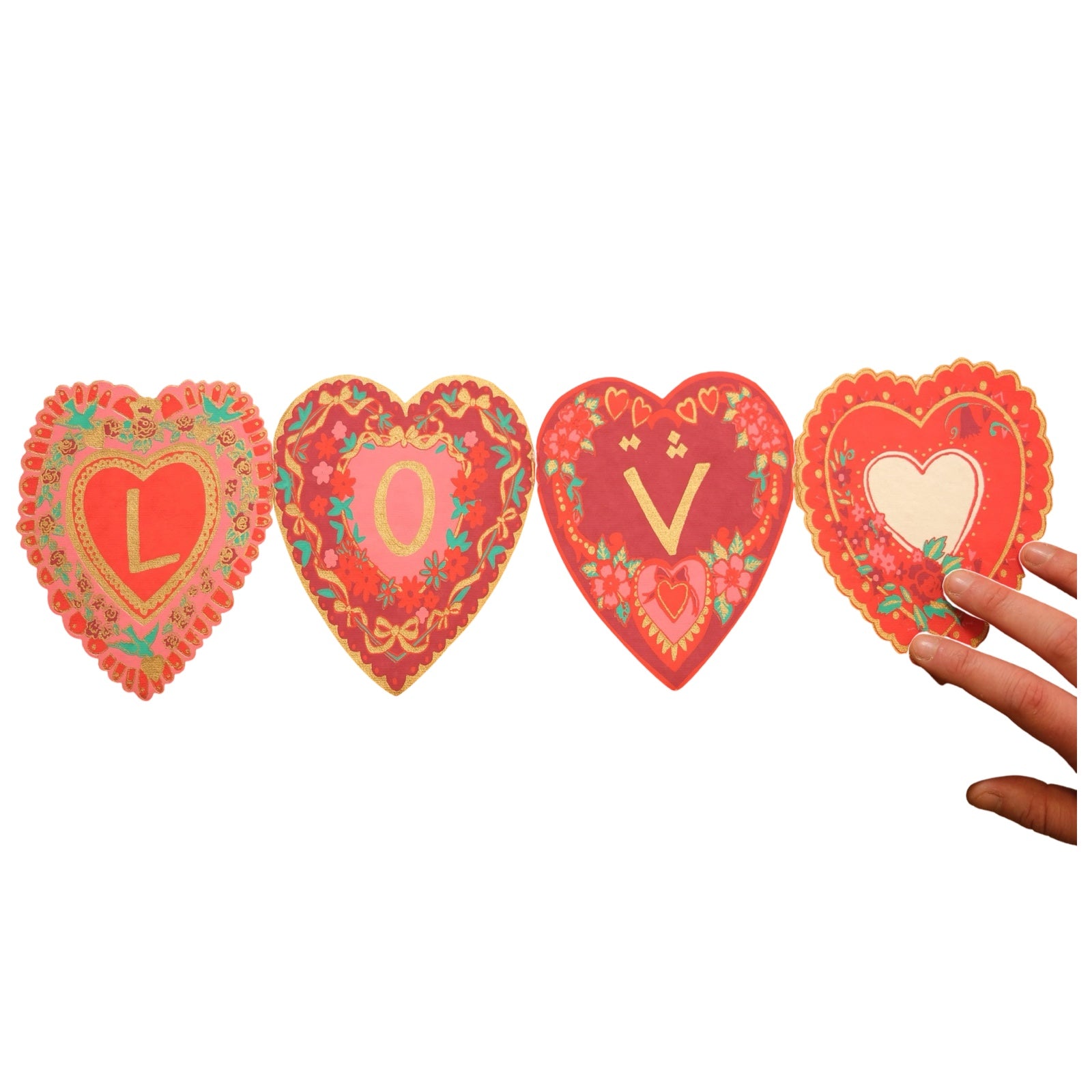 A heart-shaped concertina card with the individual letters LOV in the centre of each concertina with the final heart blank in the centre for your message.