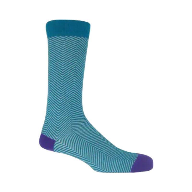Men's socks with a turquoise background and white chevrons, with a contrasting purple heel and toe and a turquoise cuff.