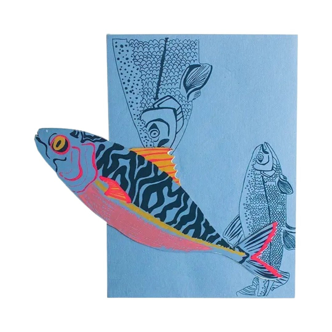 Hand-printed mackerel-shaped pop-up card in shades of blue, pink and yellow with a matching blue envelope.