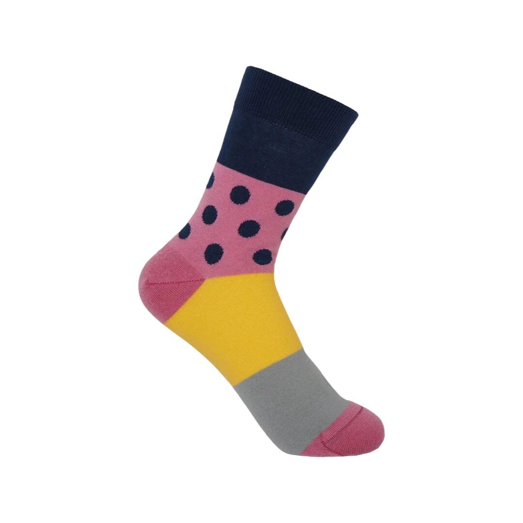 Ladies socks with a solid navy cuff with pink and navy polka dots, and a yellow and grey sole.