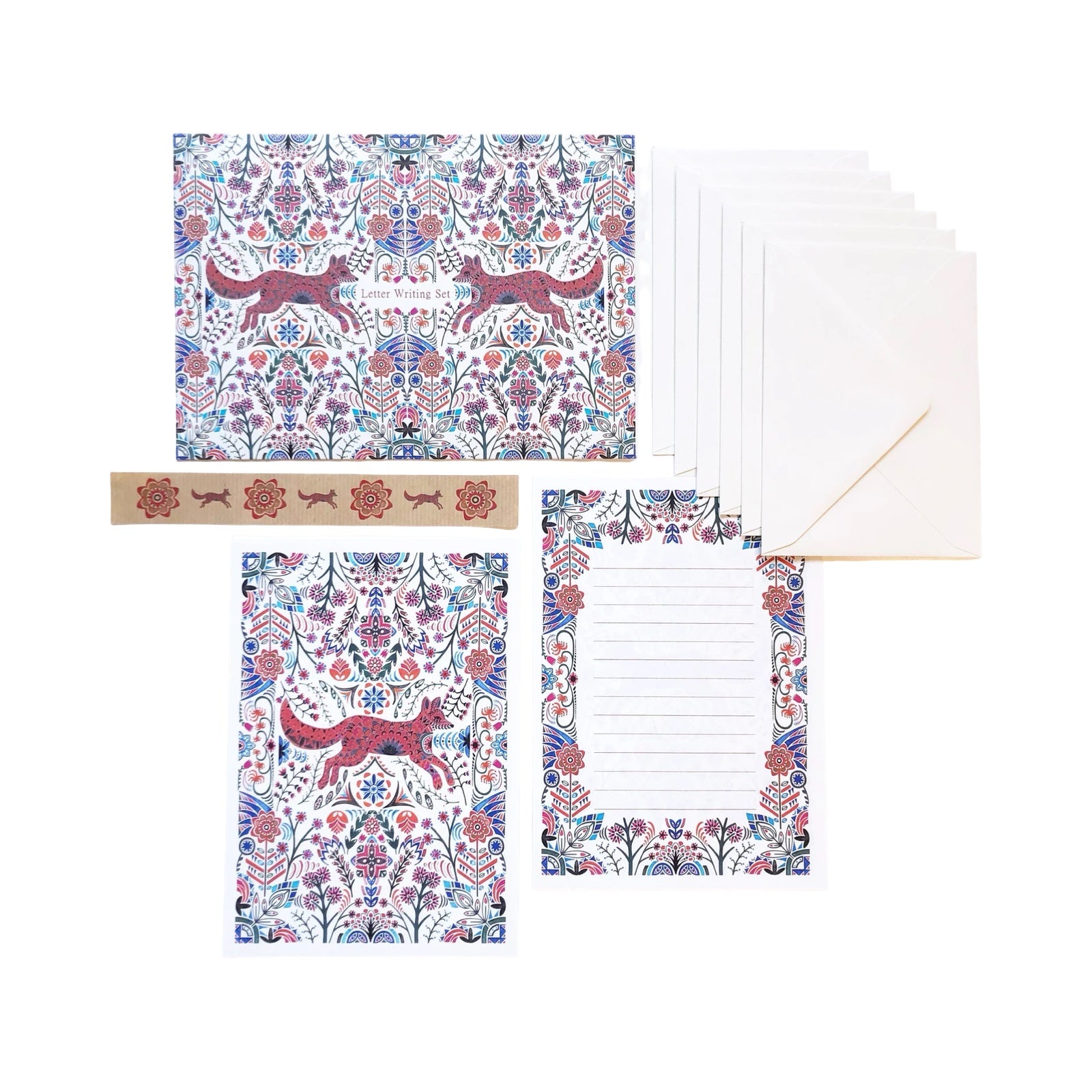 Set of stationery items with floral and fox design on a white background.