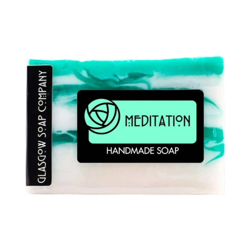 A bar of green and white meditation soap.