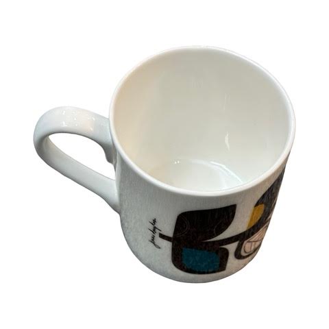 A white fine-bone china mug featuring a midcentury-inspired colourful leaf stem.