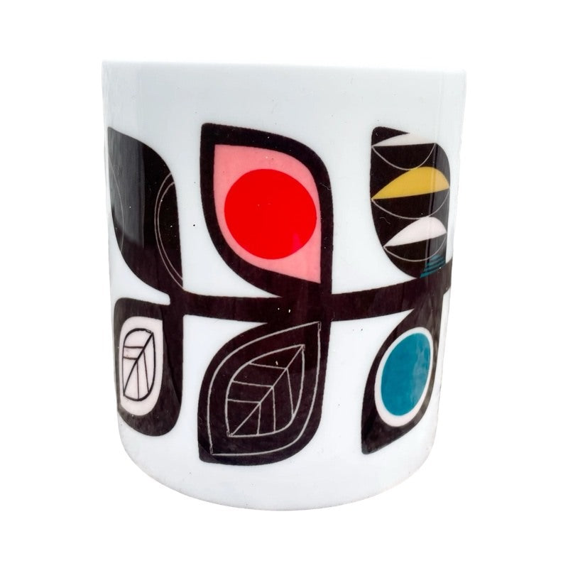 A white fine-bone china mug featuring a midcentury-inspired colourful leaf stem.