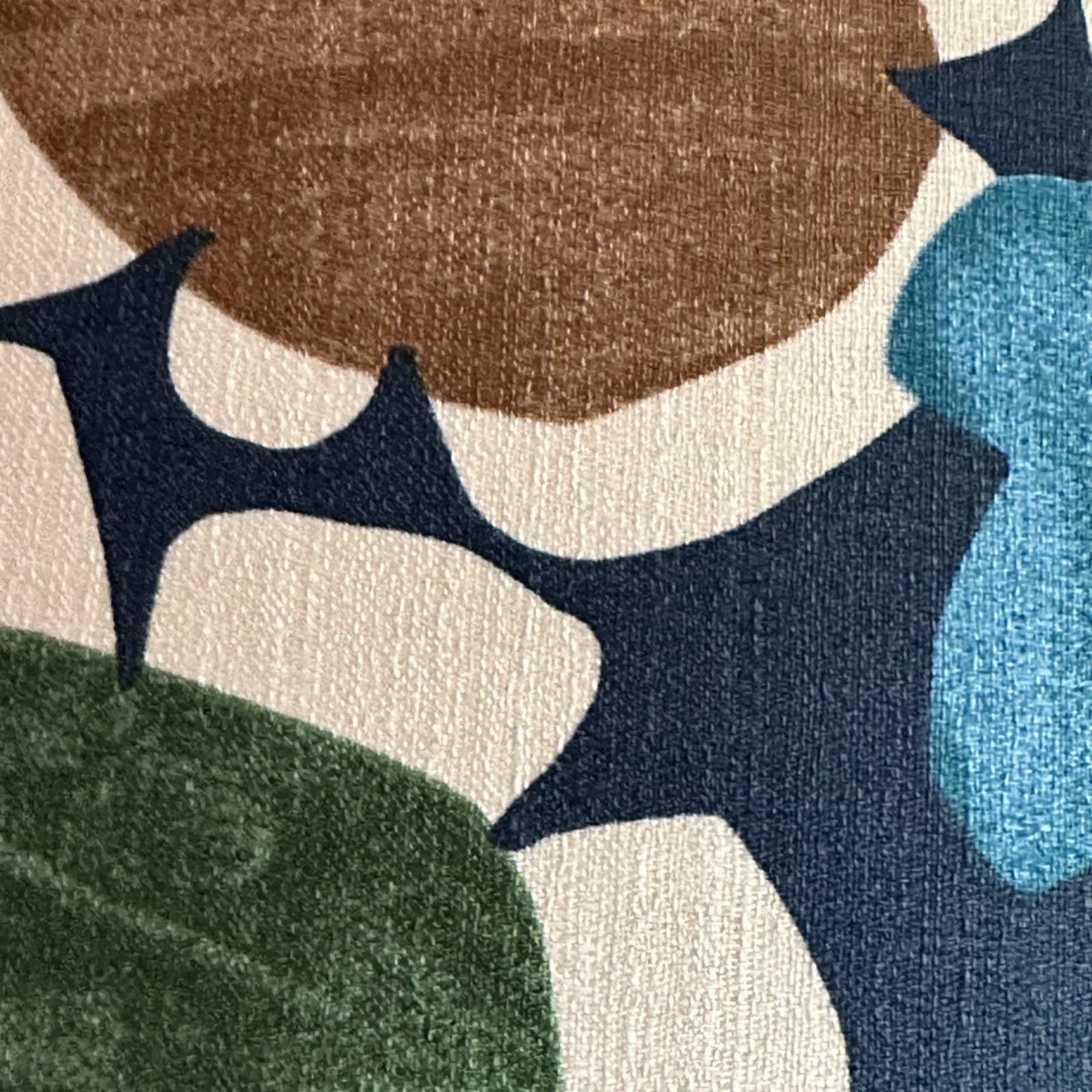 Navy light barkcloth fabric with turquoise, green and brown flowers.