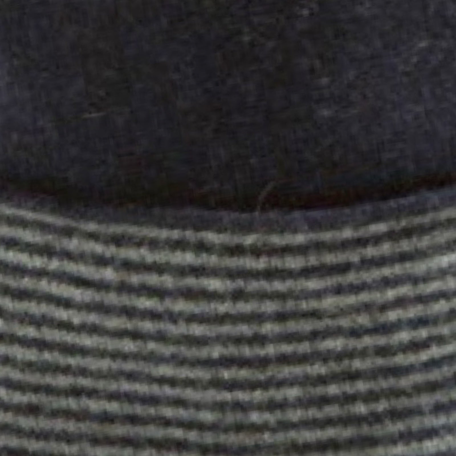 Close-up of dark gray fabric.