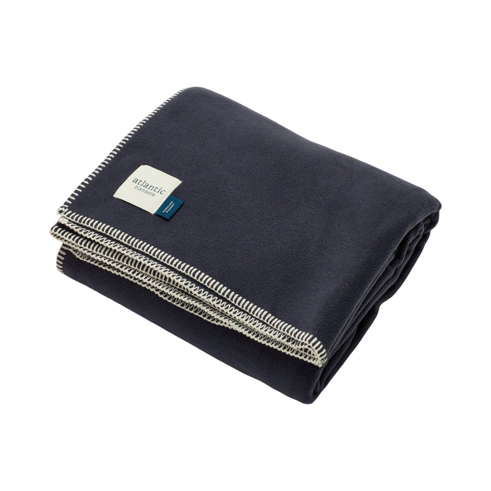 Folded navy blanket with Atlantic Blankets brand label on a white background.