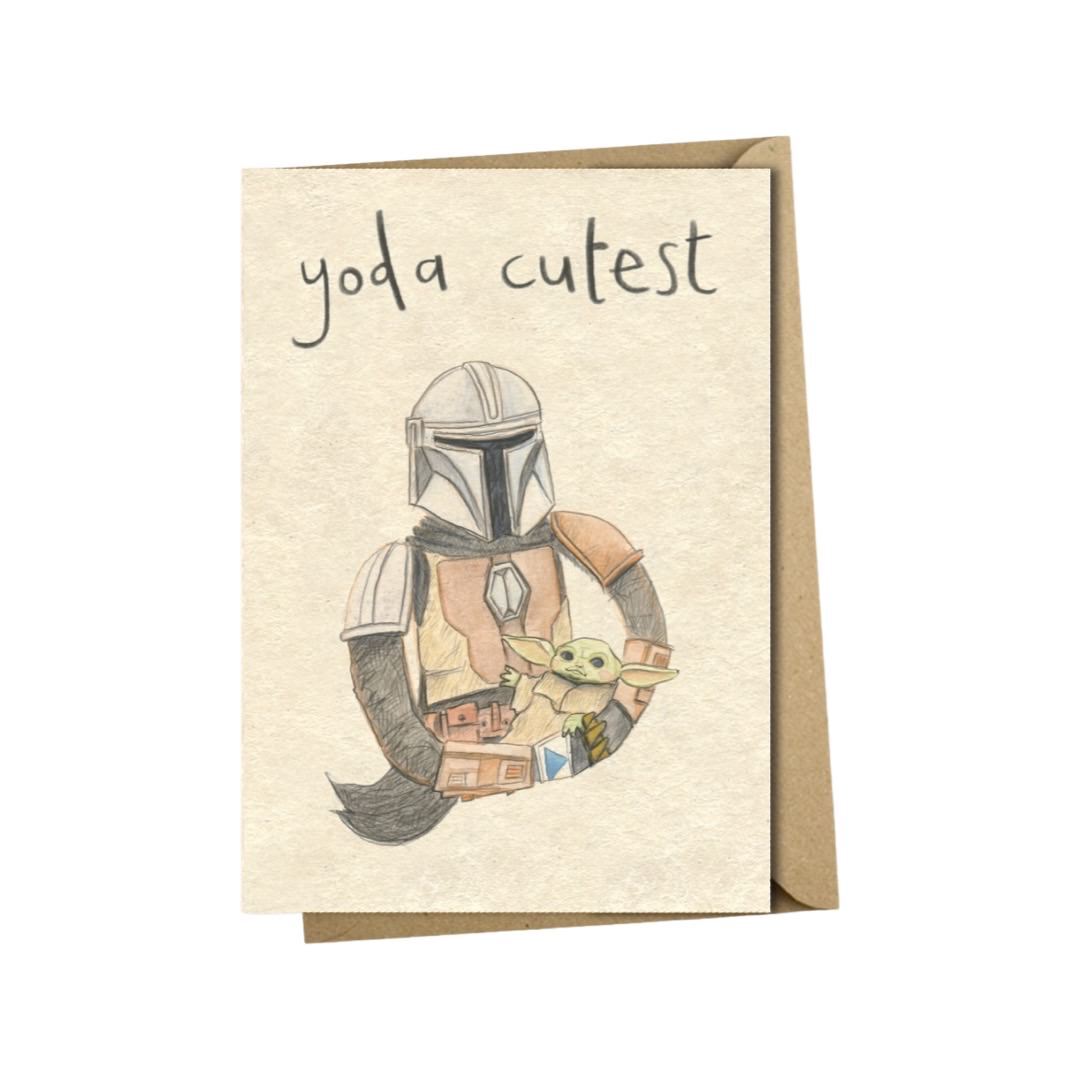 New baby card featuring an illustration of Mando the bounty hunter carrying baby Yoda, inspired by Star Wars.