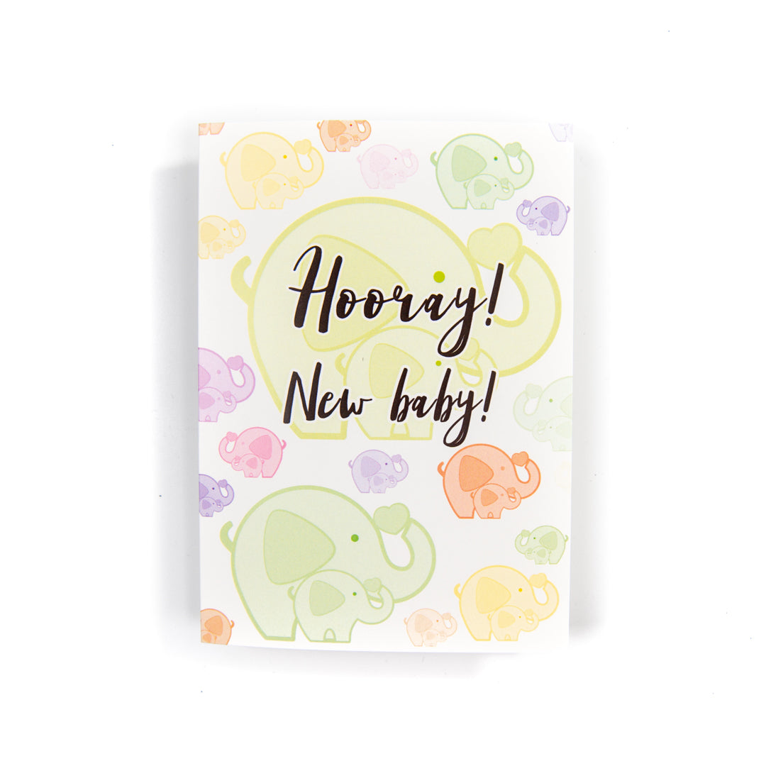 Greeting card with baby shower design featuring elephants and 'Hooray! New baby!' text on a white background.