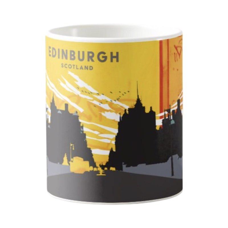 This mug features a panoramic artwork of North Bridge in Edinburgh, featuring the Scotsman Hotel and the Carlton Hotel in silhouette with a yellow and orange sky