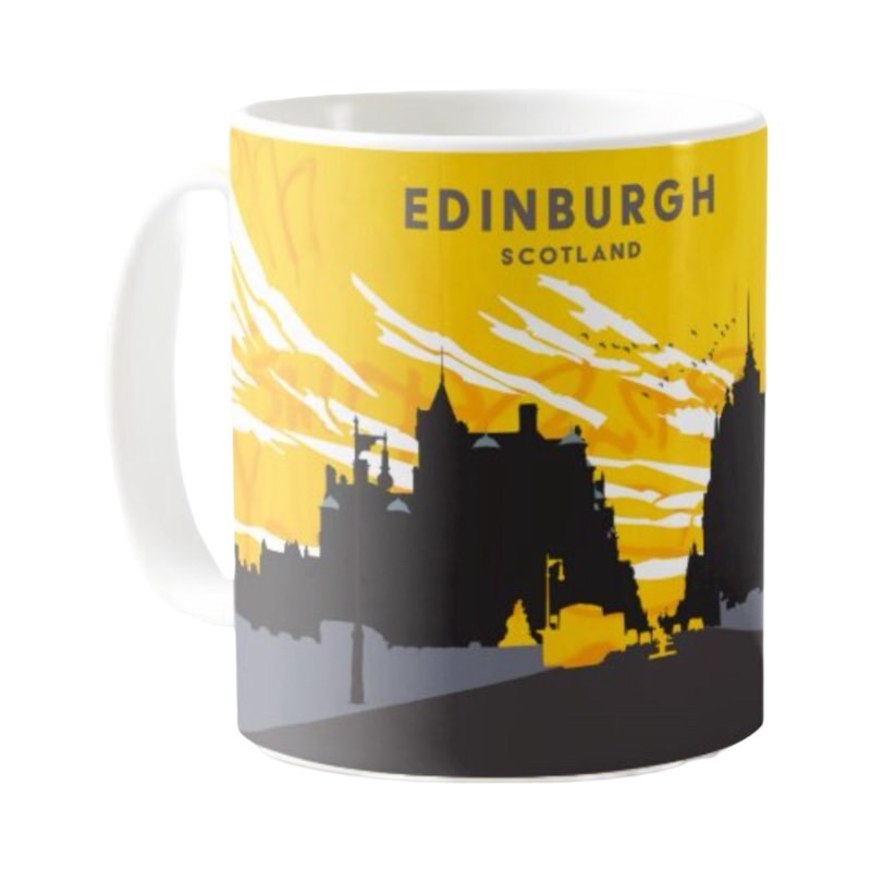 This mug features a panoramic artwork of North Bridge in Edinburgh, featuring the Scotsman Hotel and the Carlton Hotel in silhouette with a yellow and orange sky